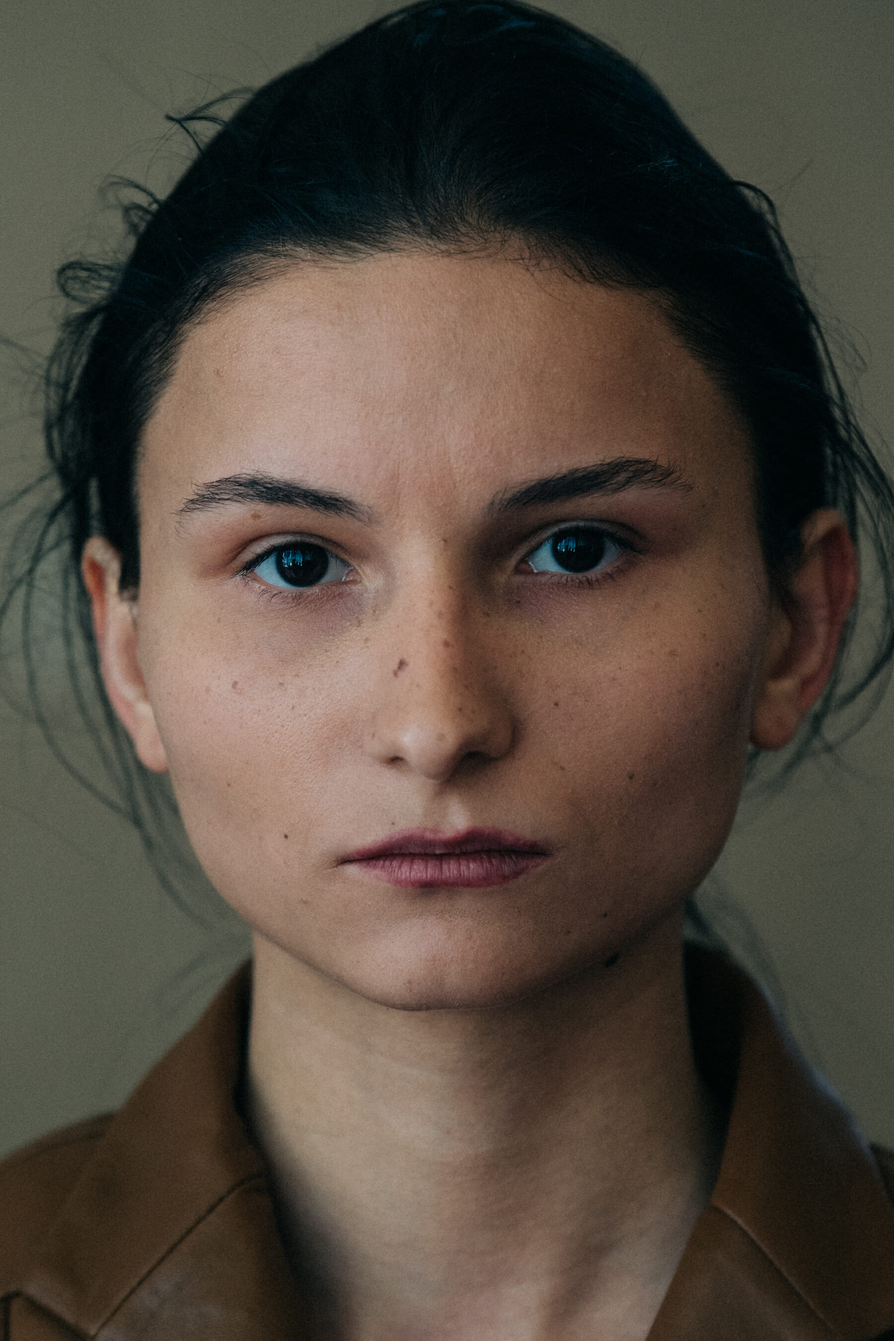 Portrait of model with tied back hair