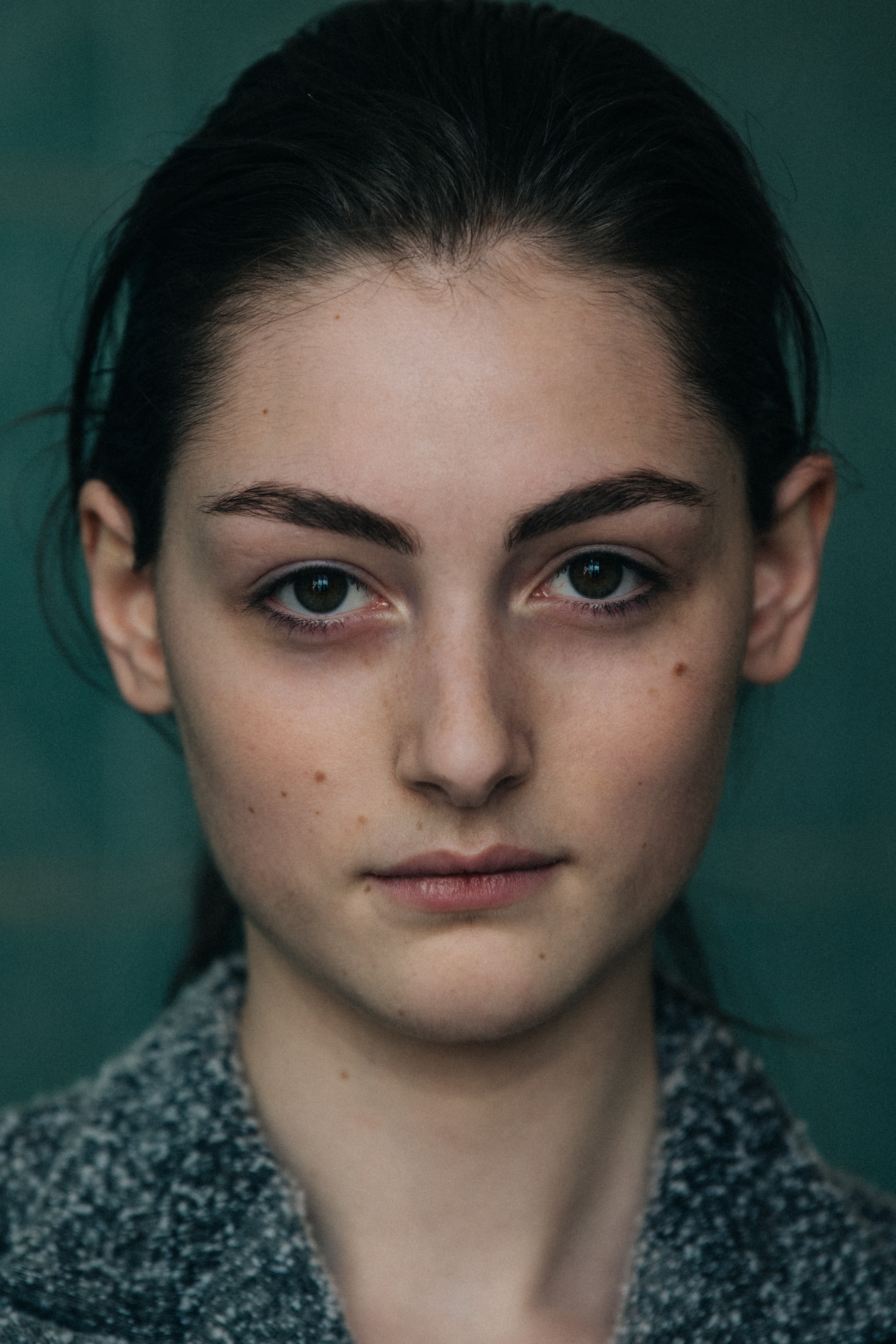 Portrait of model with tied back hair