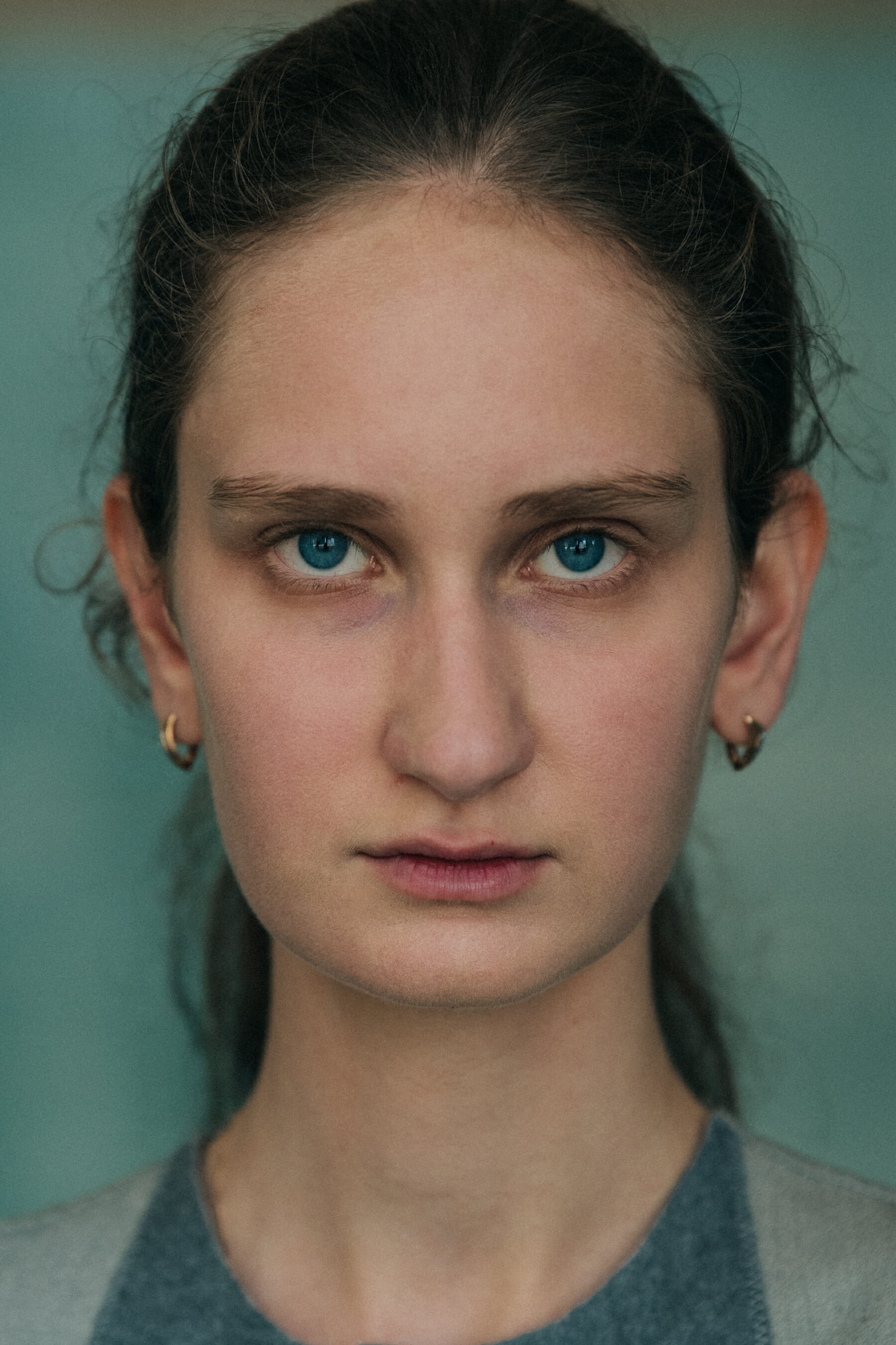 Portrait of model with tied back hair
