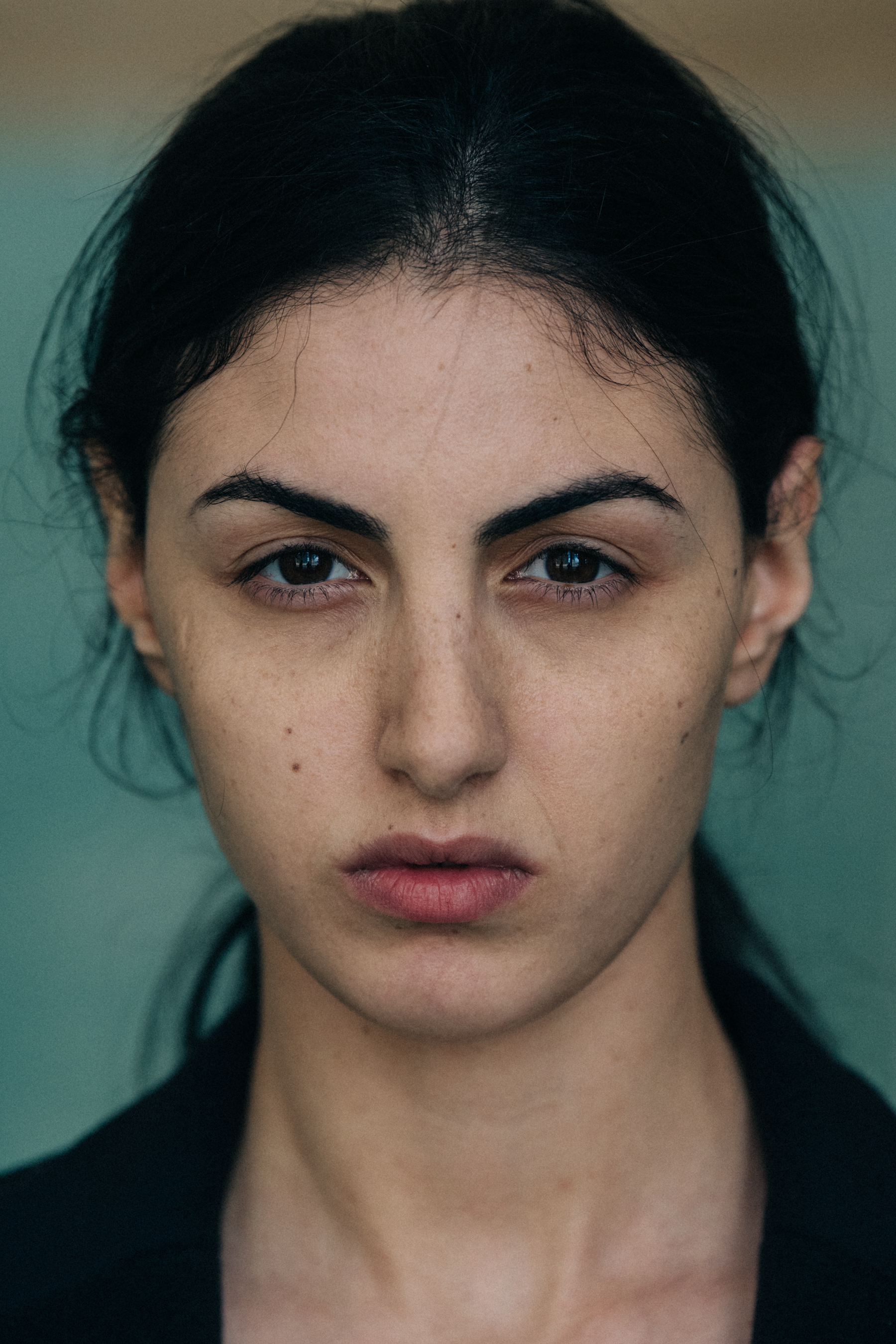 Portrait of model with tied back hair