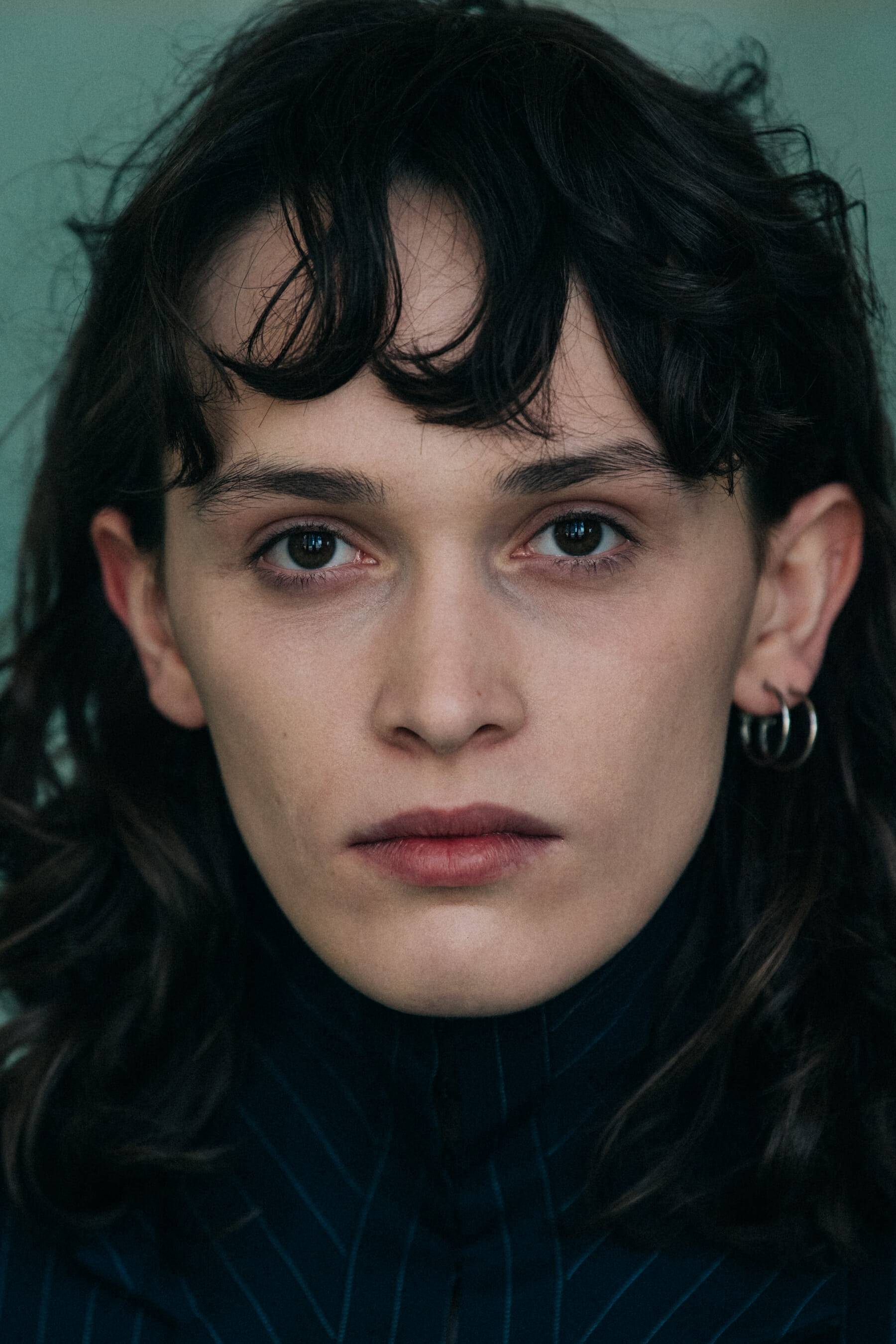 Portrait of model with tied back hair