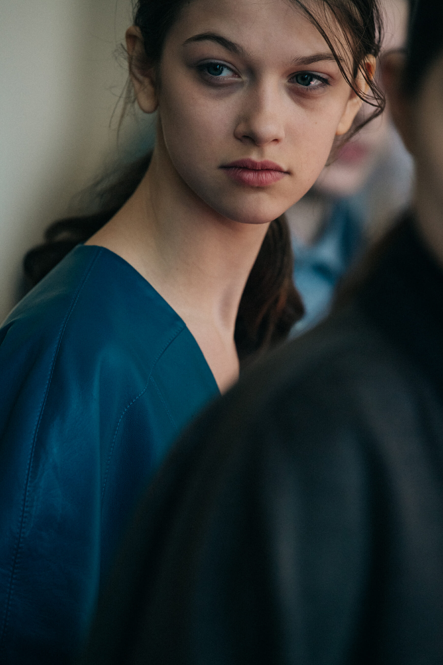 Model wearing blue outfit at Situationist