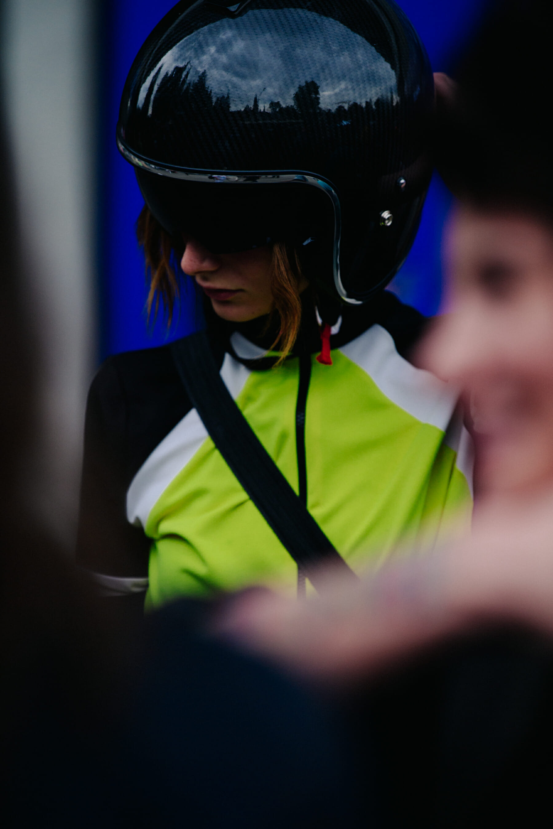 Woman wearing motorcycle helmet