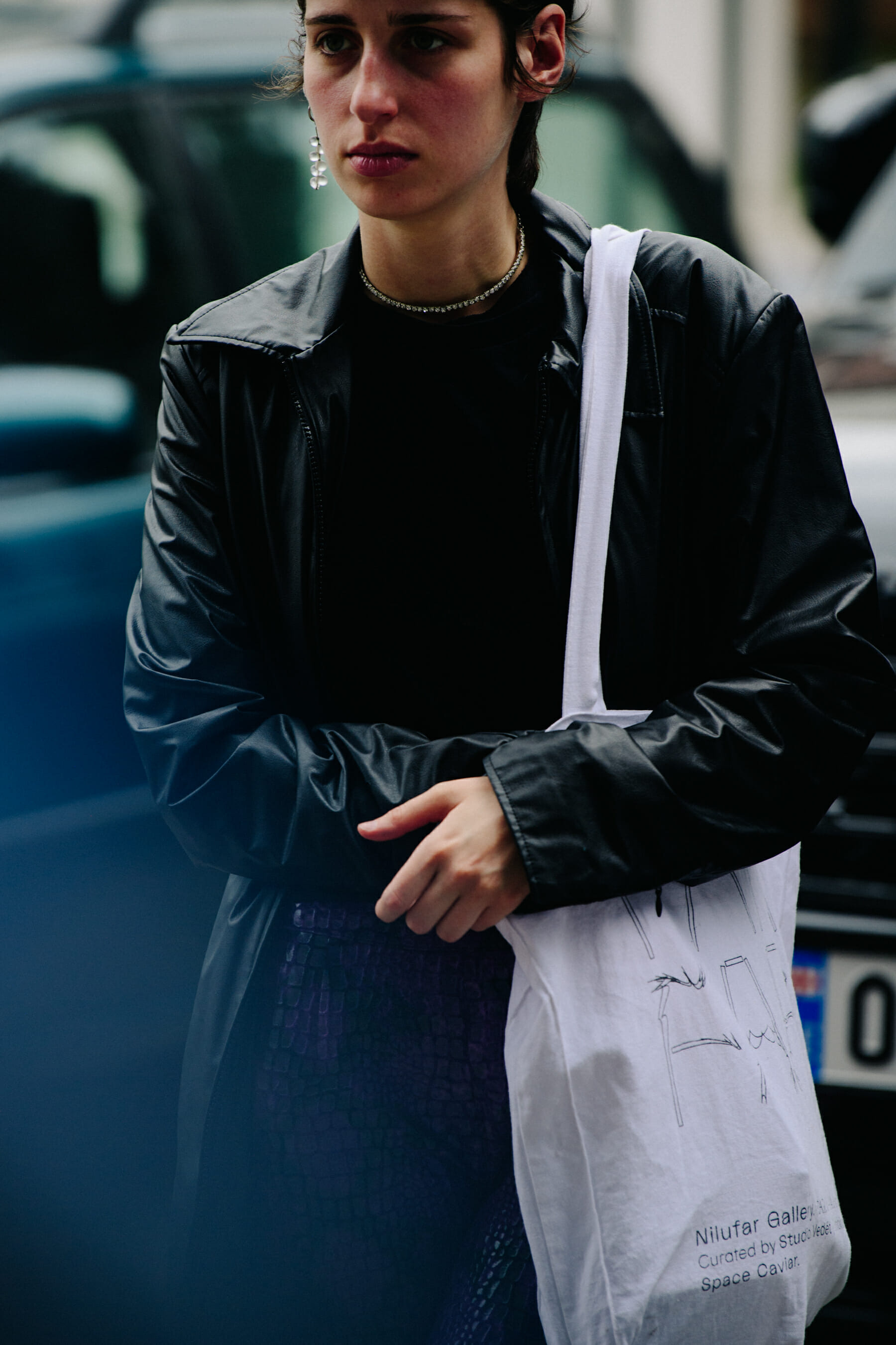 Woman wearing black leather jacket