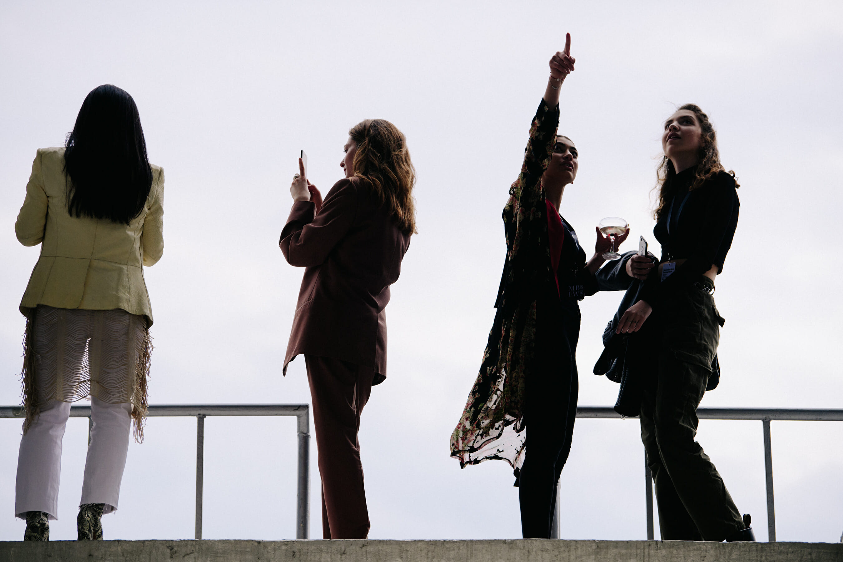 Four women wearing smart jackets