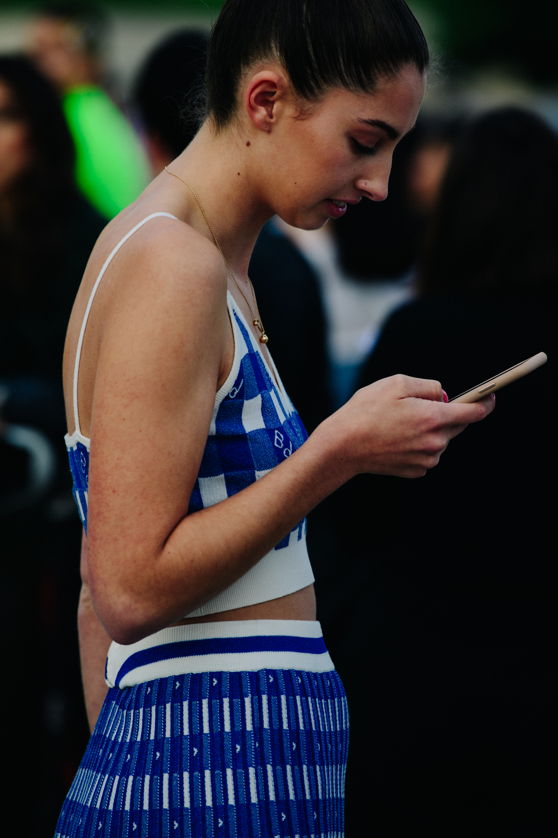Woman wearing blue check dress