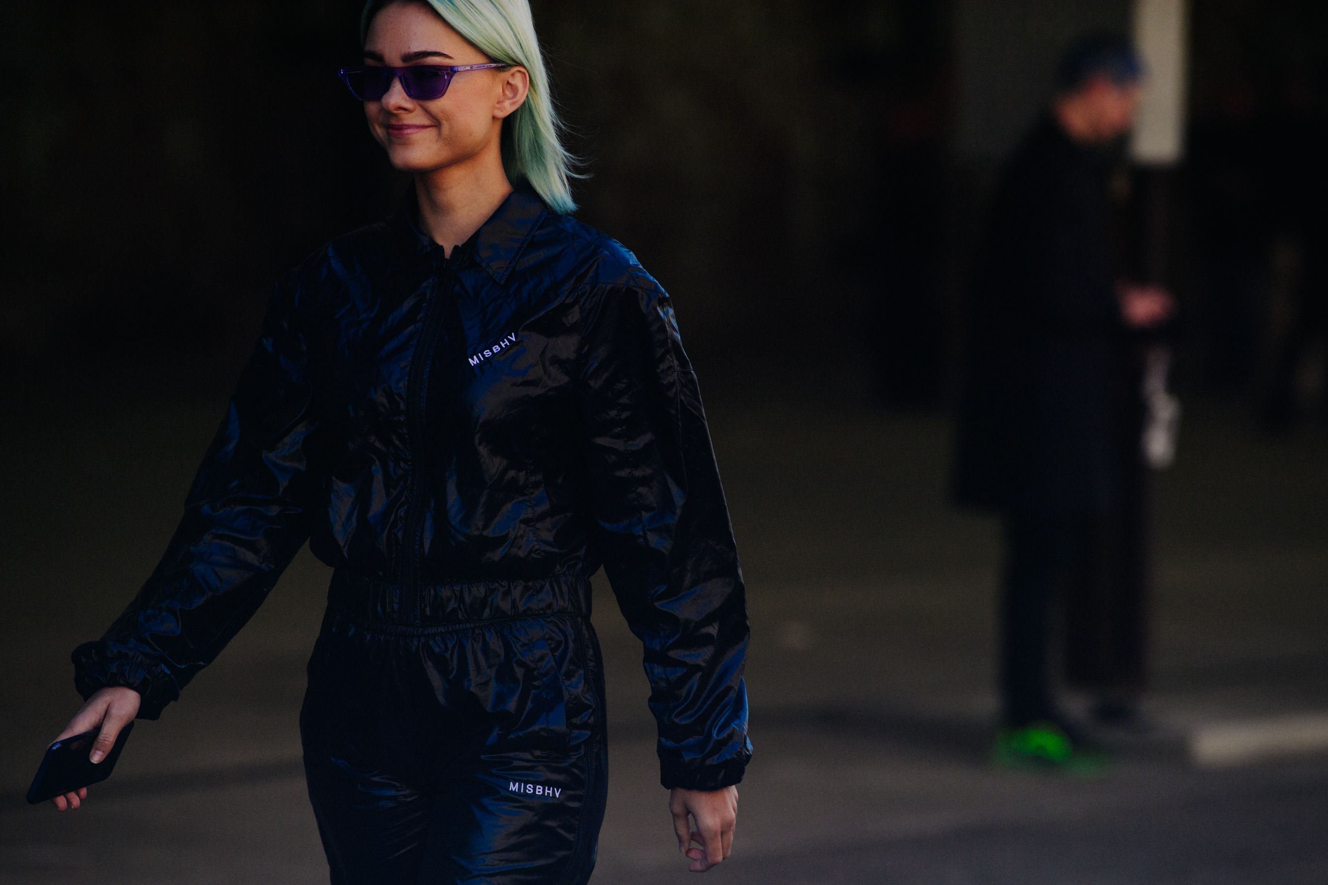 Woman wearing black jumpsuit