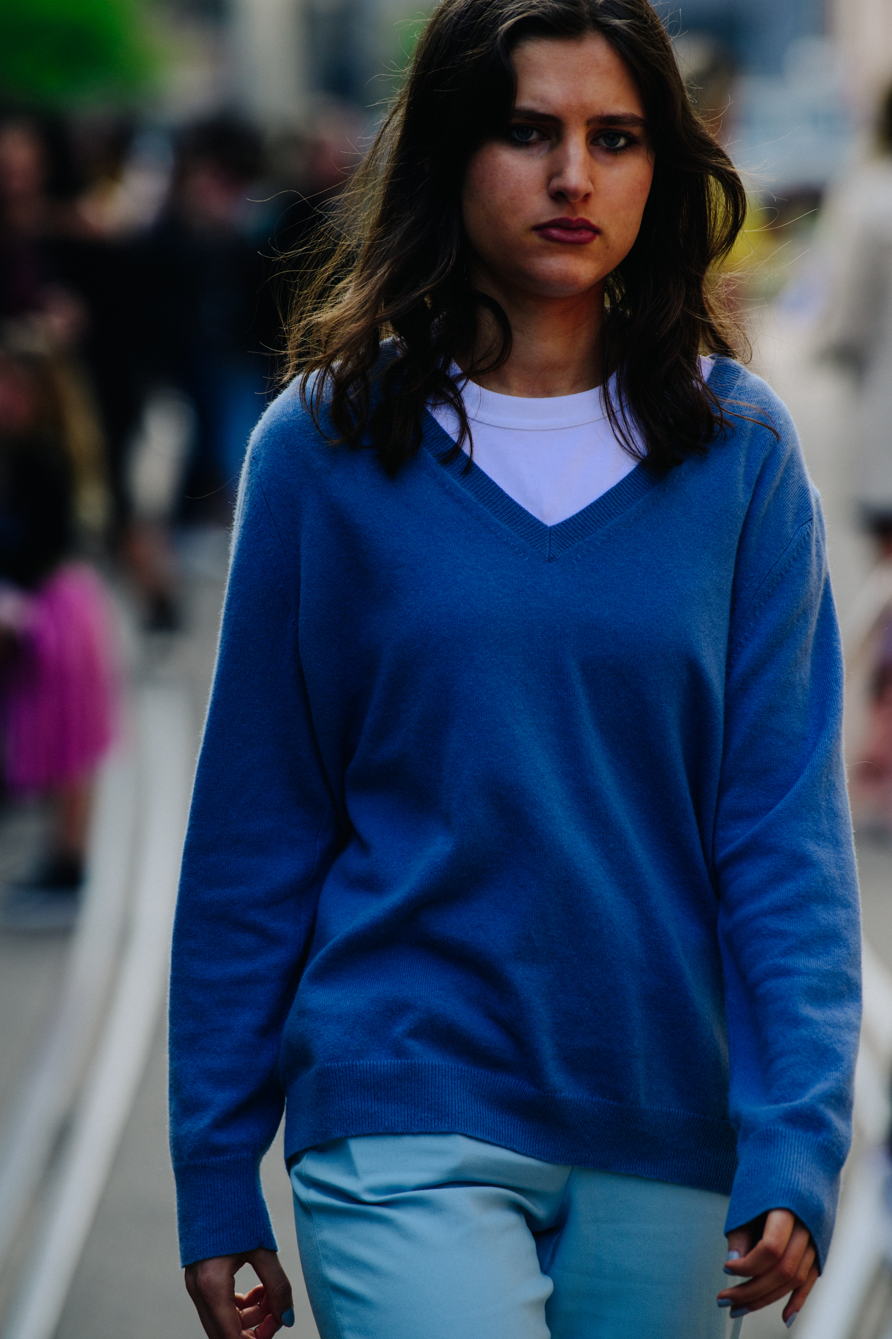 Woman wearing blue jumper