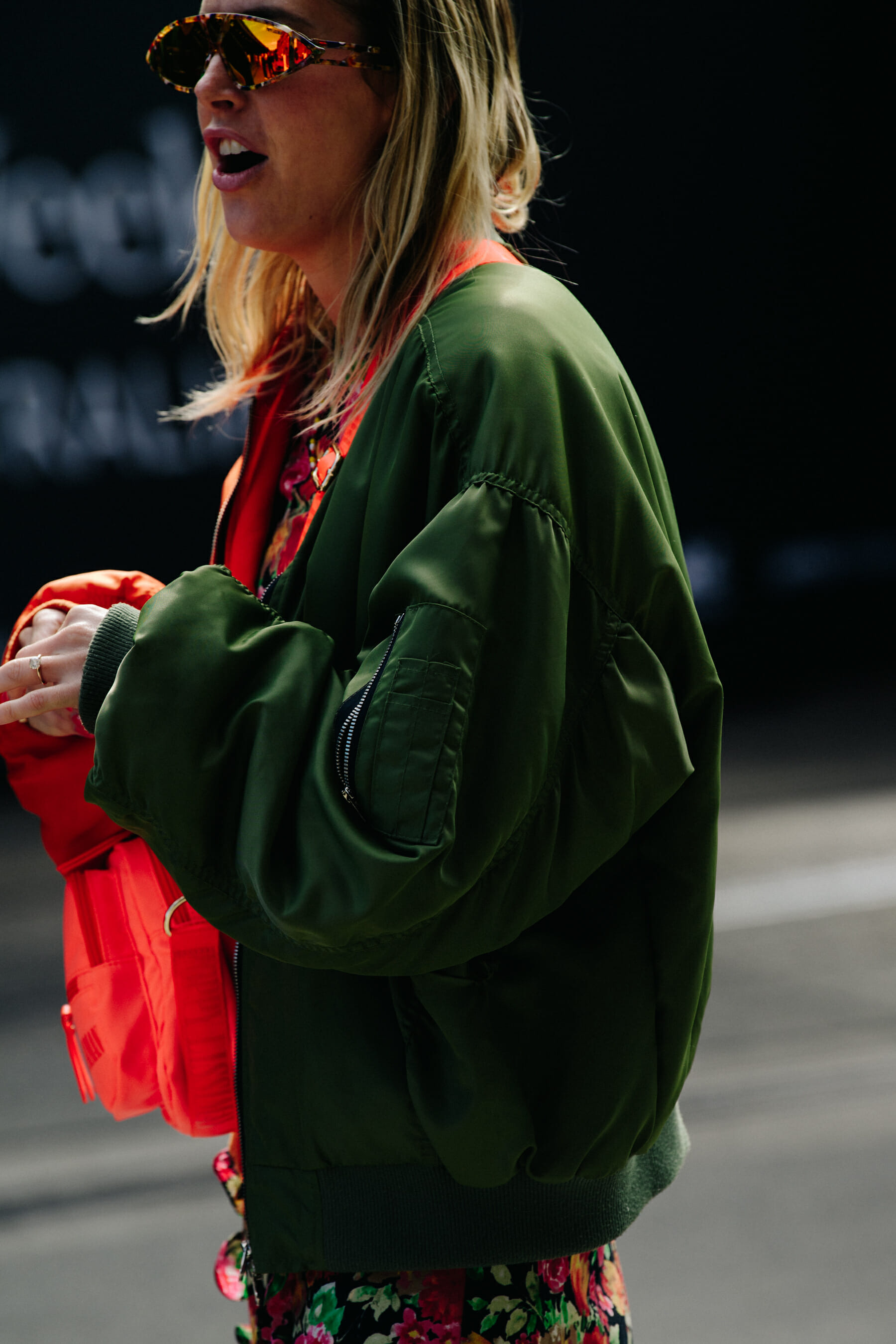 Woman wearing green jacket