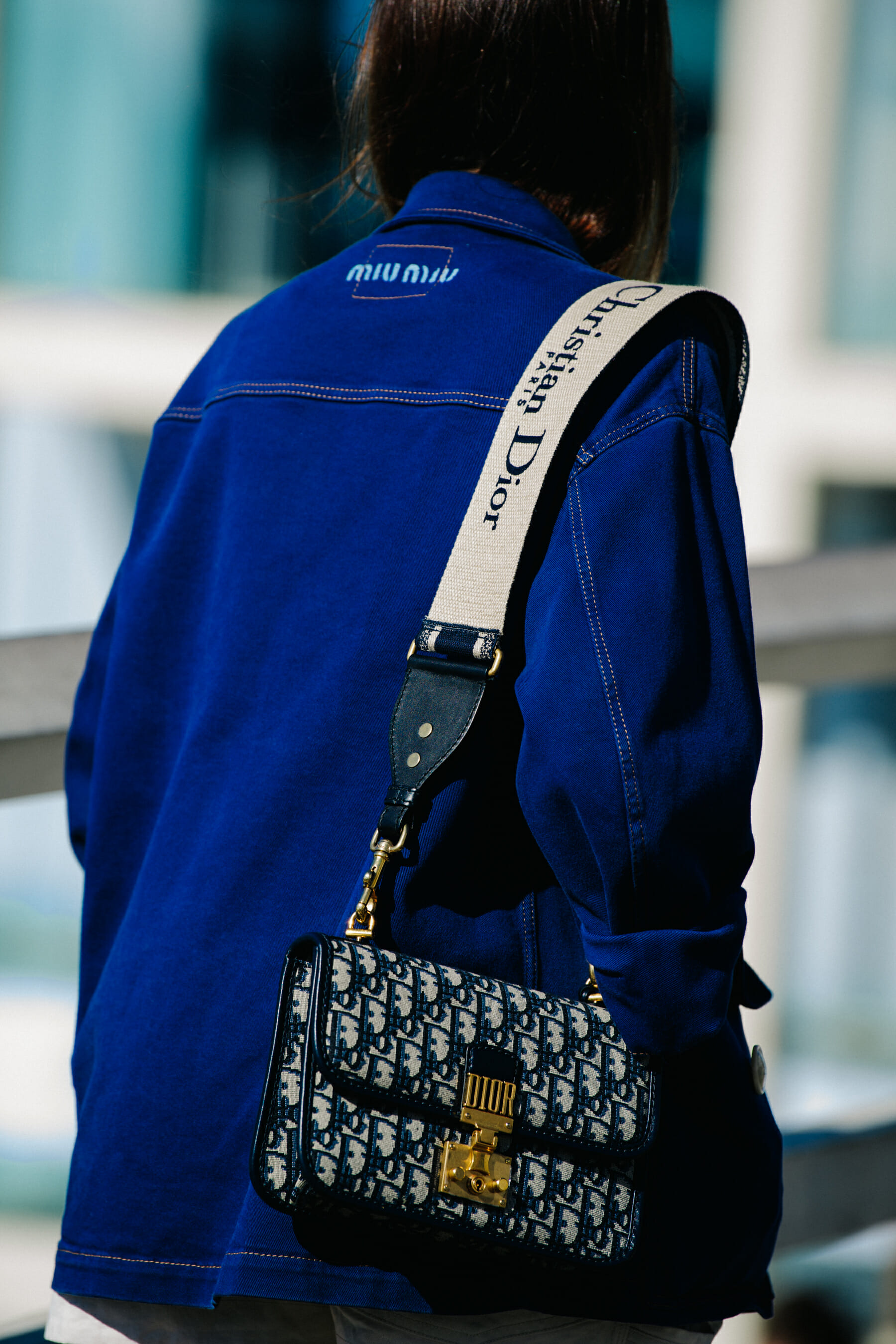 Woman carrying Dior bag
