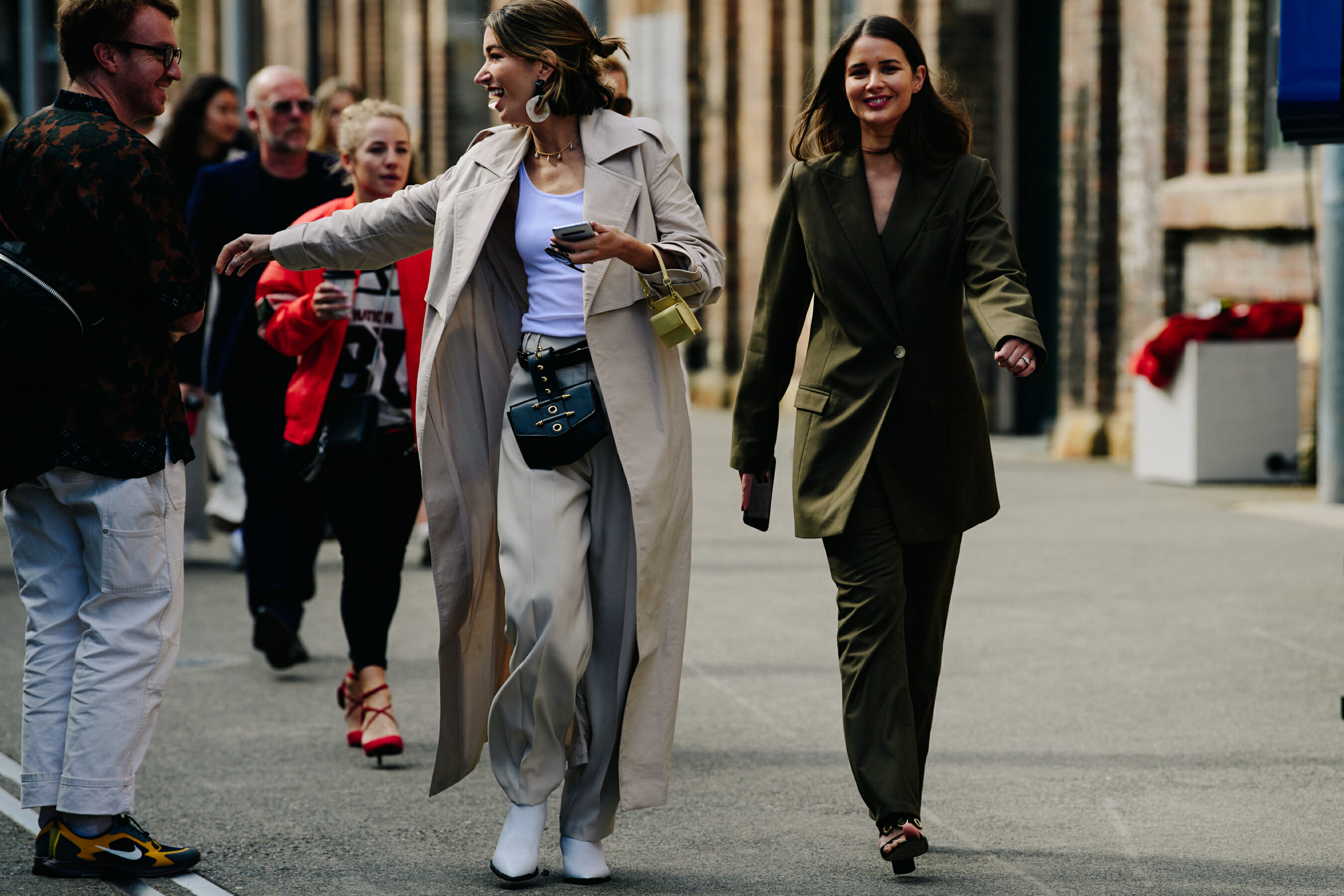 Two women wearing long pants