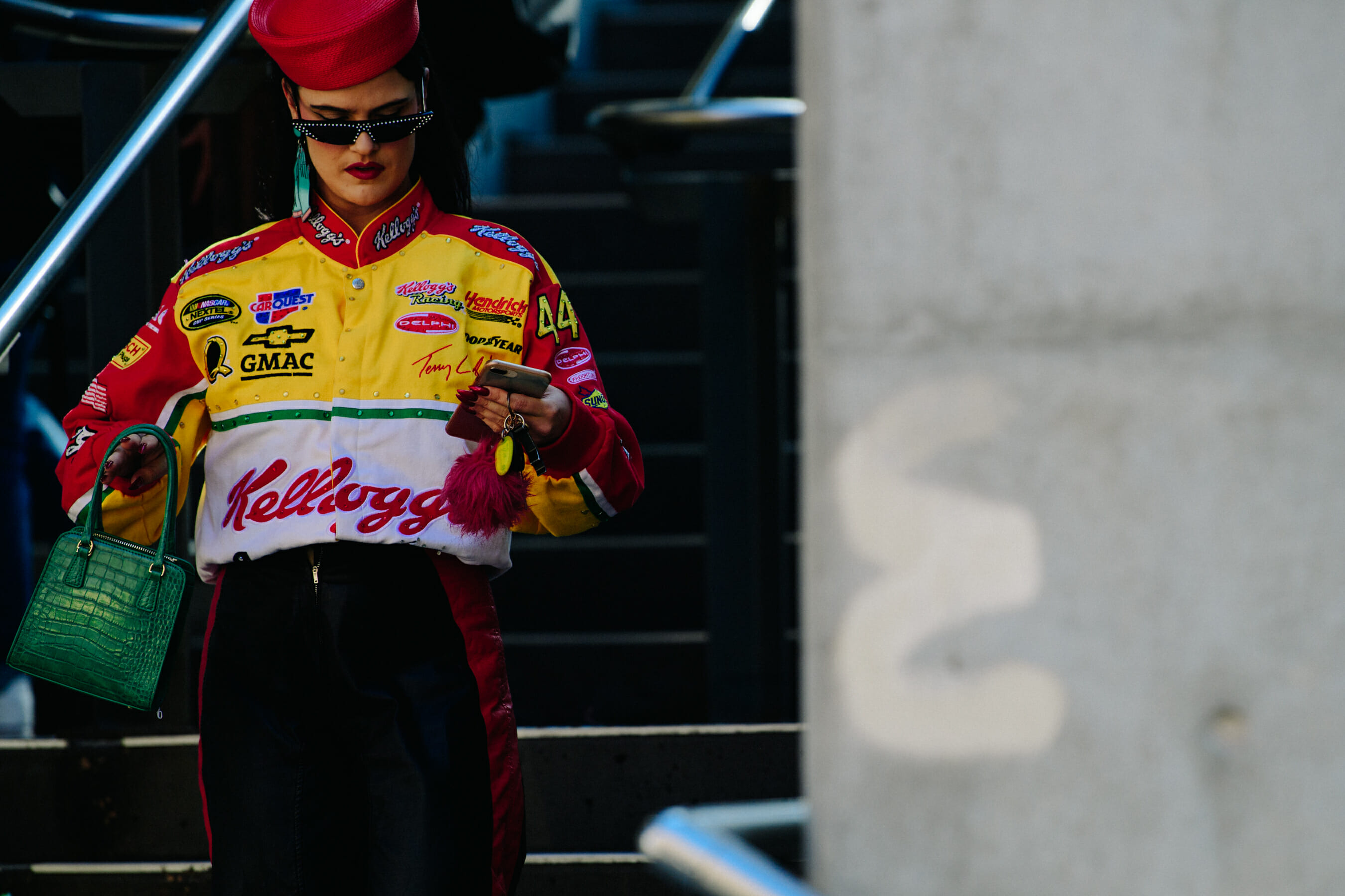 Woman wearing colourful motrocycle jacket