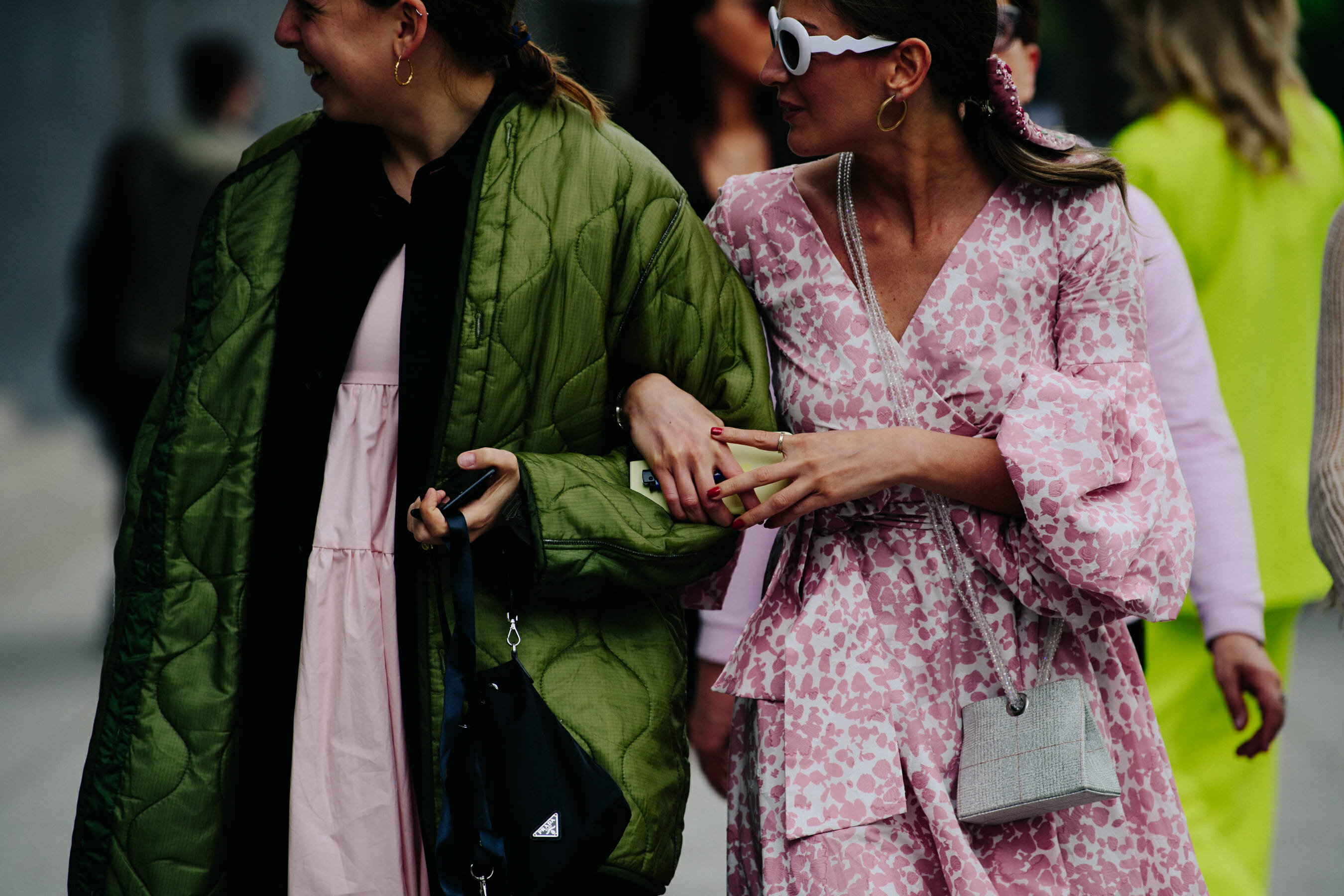Two women wearing pink