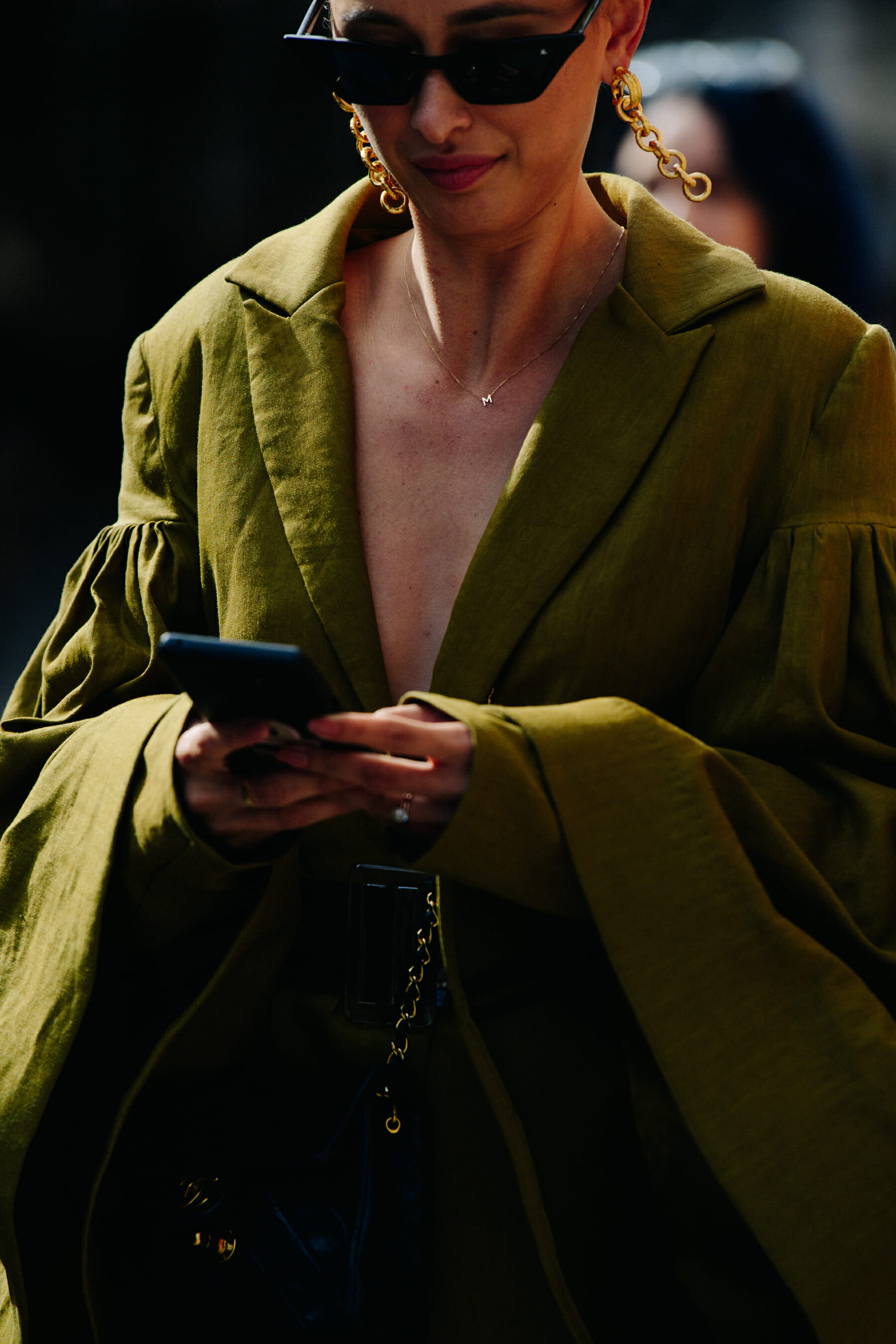 Woman wearing green top