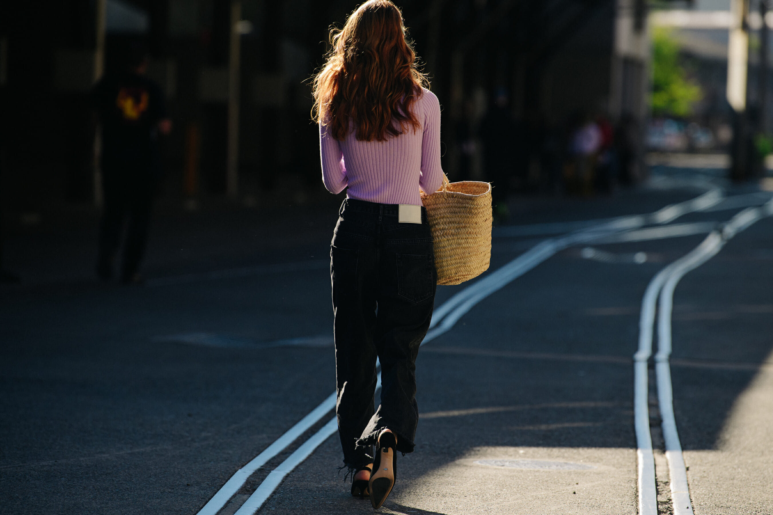 Woman wearing pink jumper