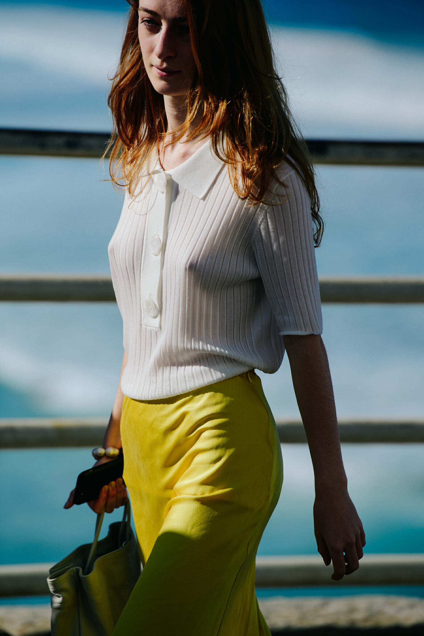 Woman wearing yellow skirt