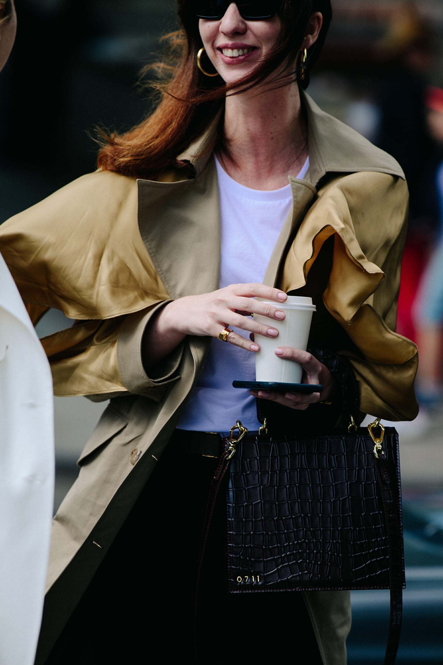 Woman wearing trench coat