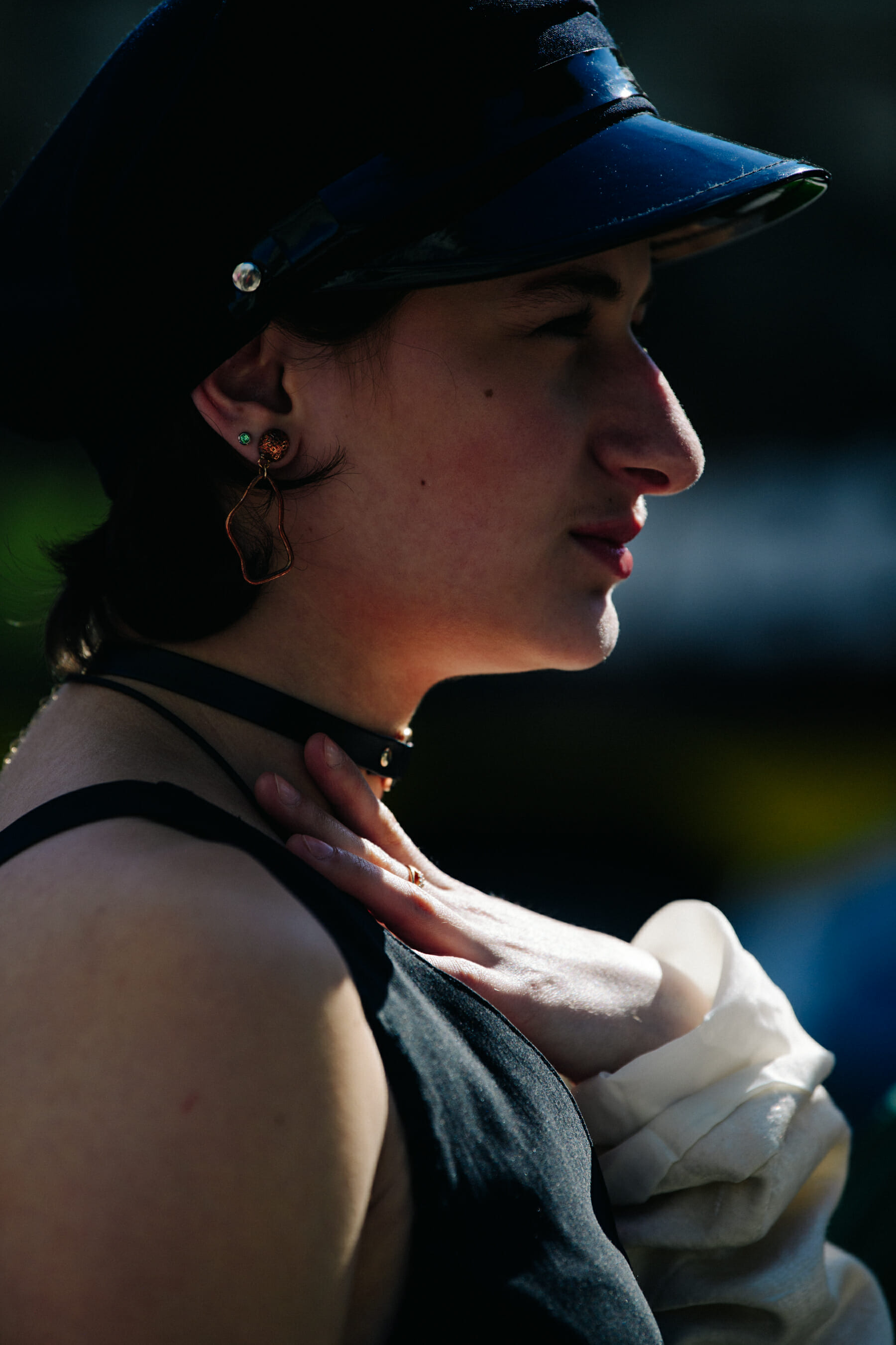 Woman wearing black hat