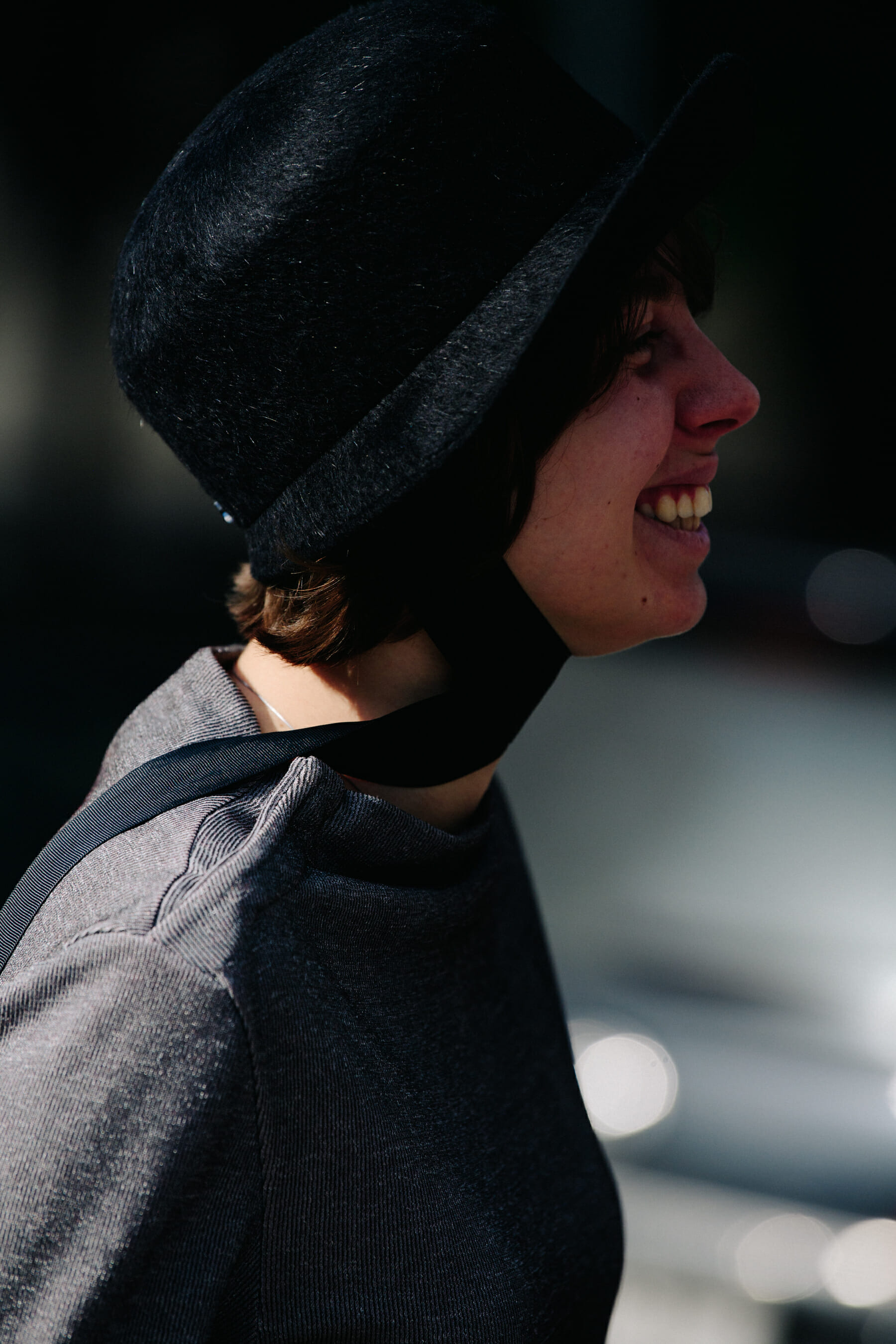Woman wearing black hat
