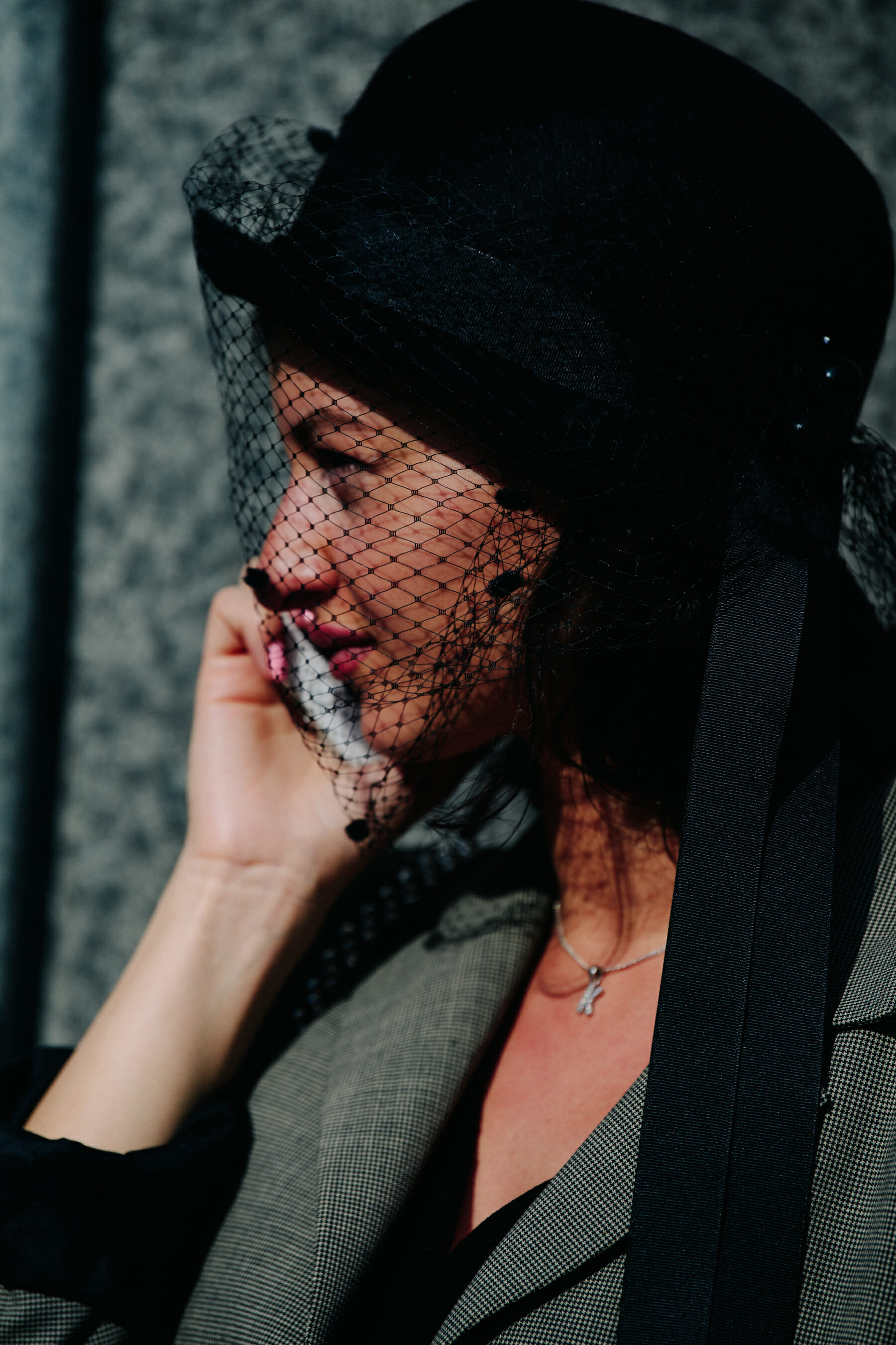Woman wearing black hat