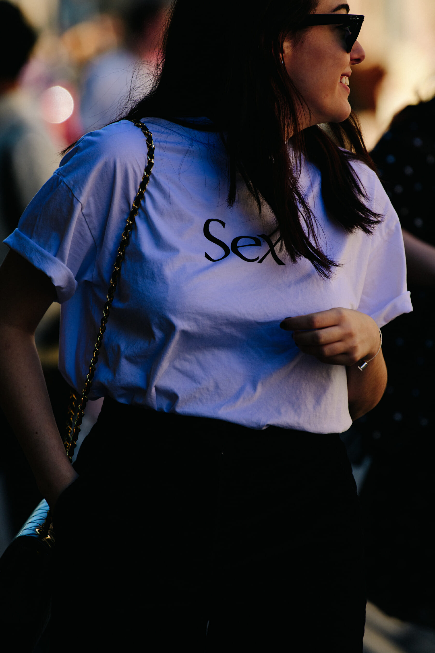 Woman wearing white graphic tee