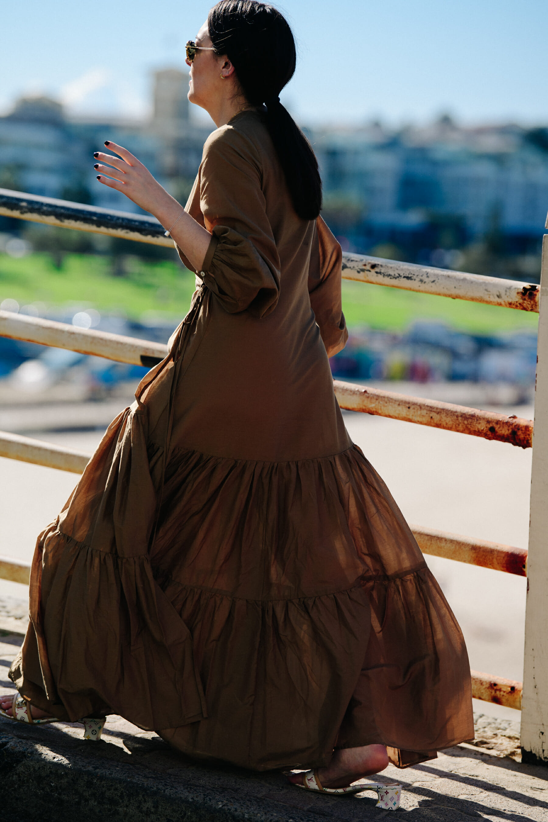 Woman wearing brown dress
