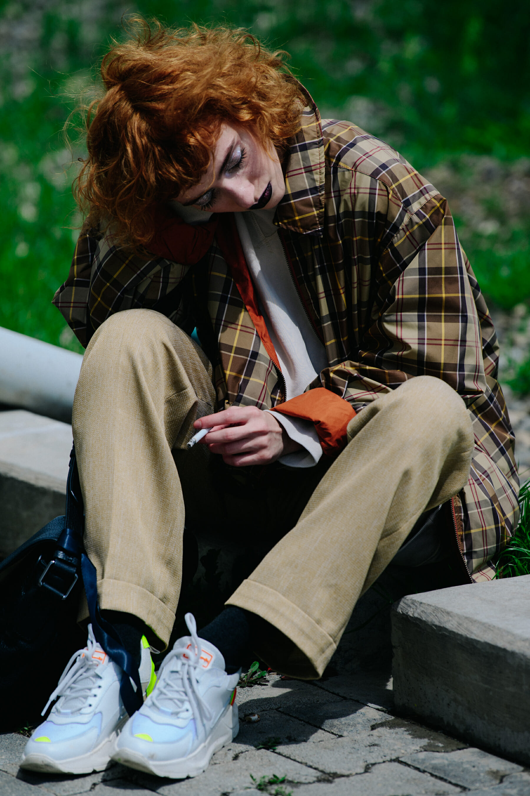 Model wearing check shirt