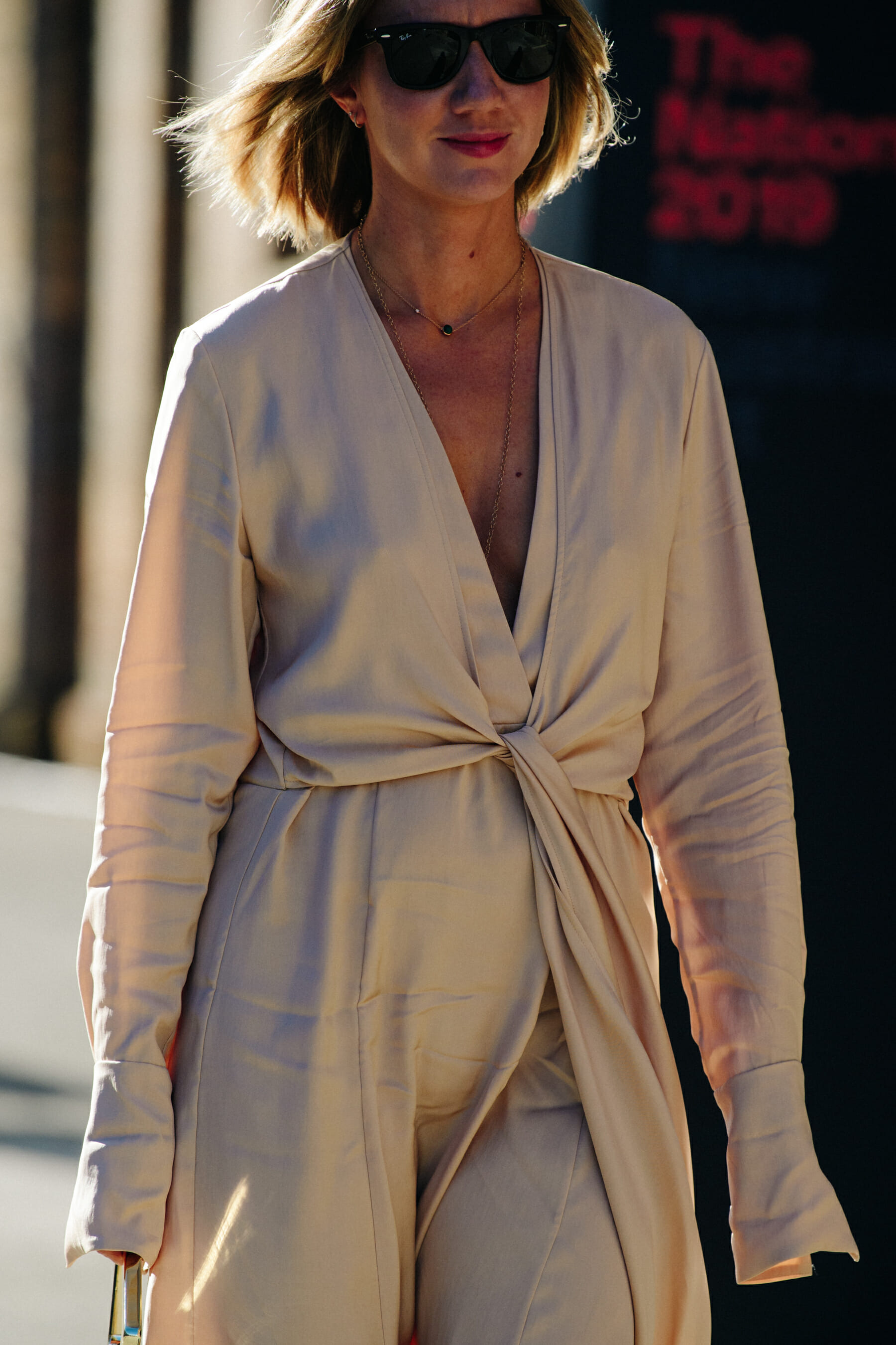 Woman wearing light coat
