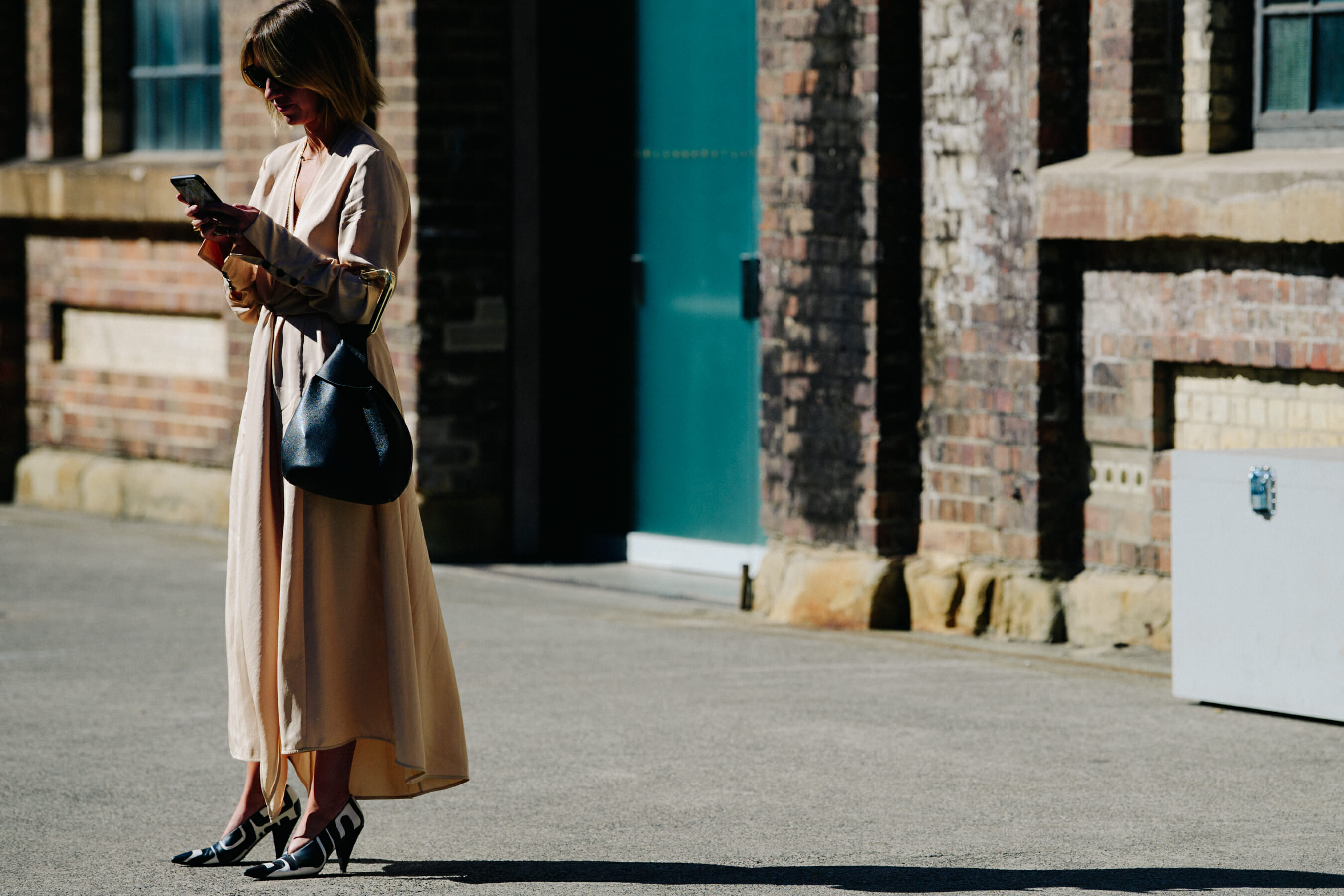 Woman wearing long cream dress