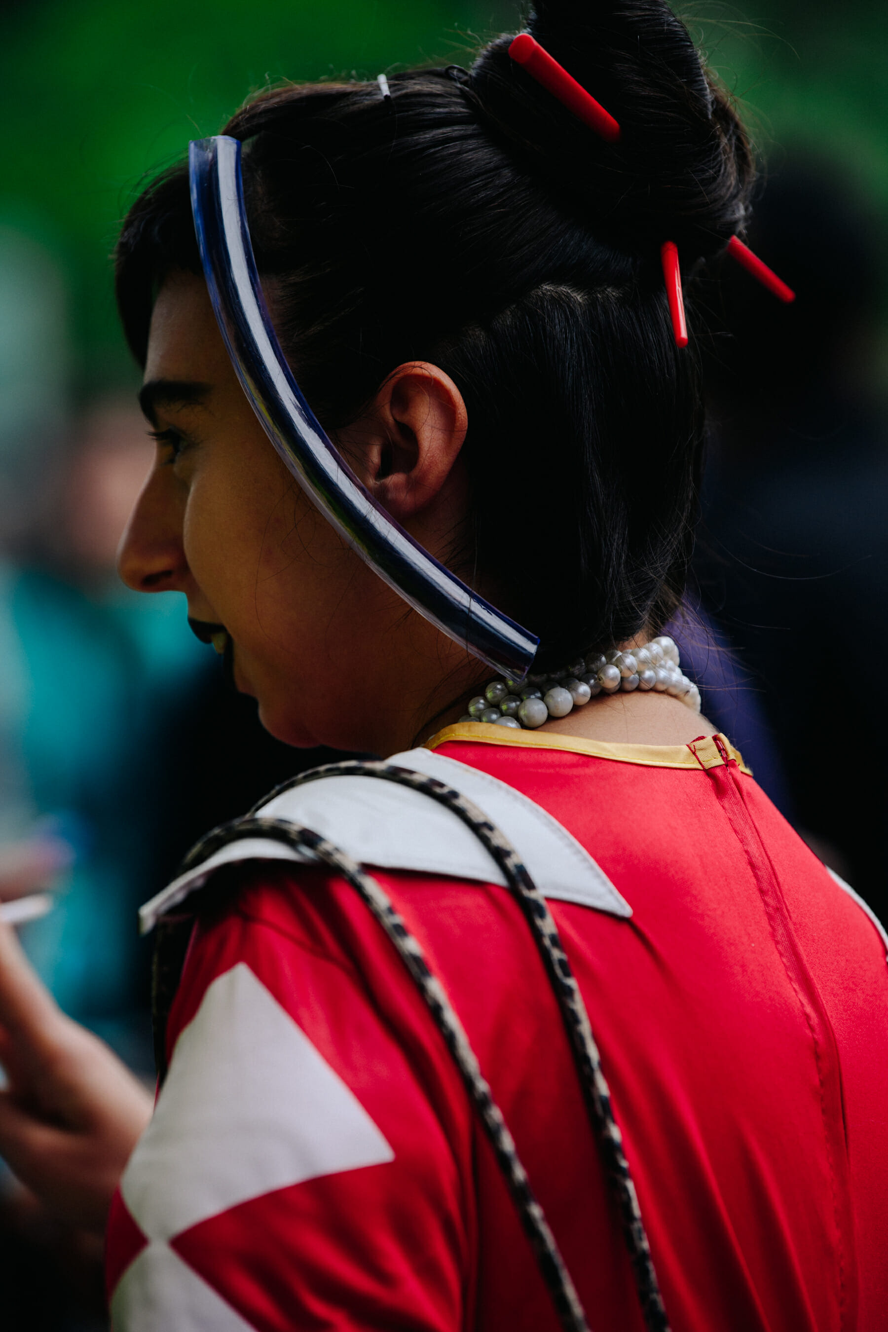 Woman wearing red power ranger suit