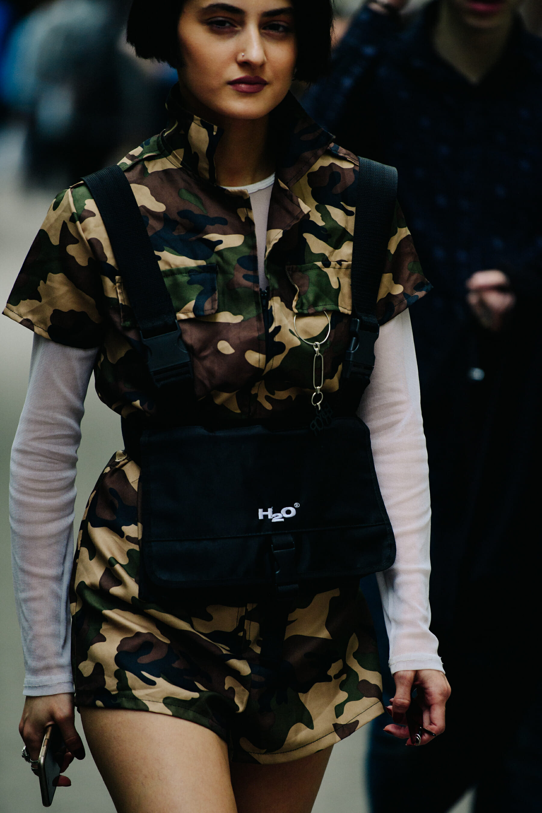 Woman wearing camouflage dress