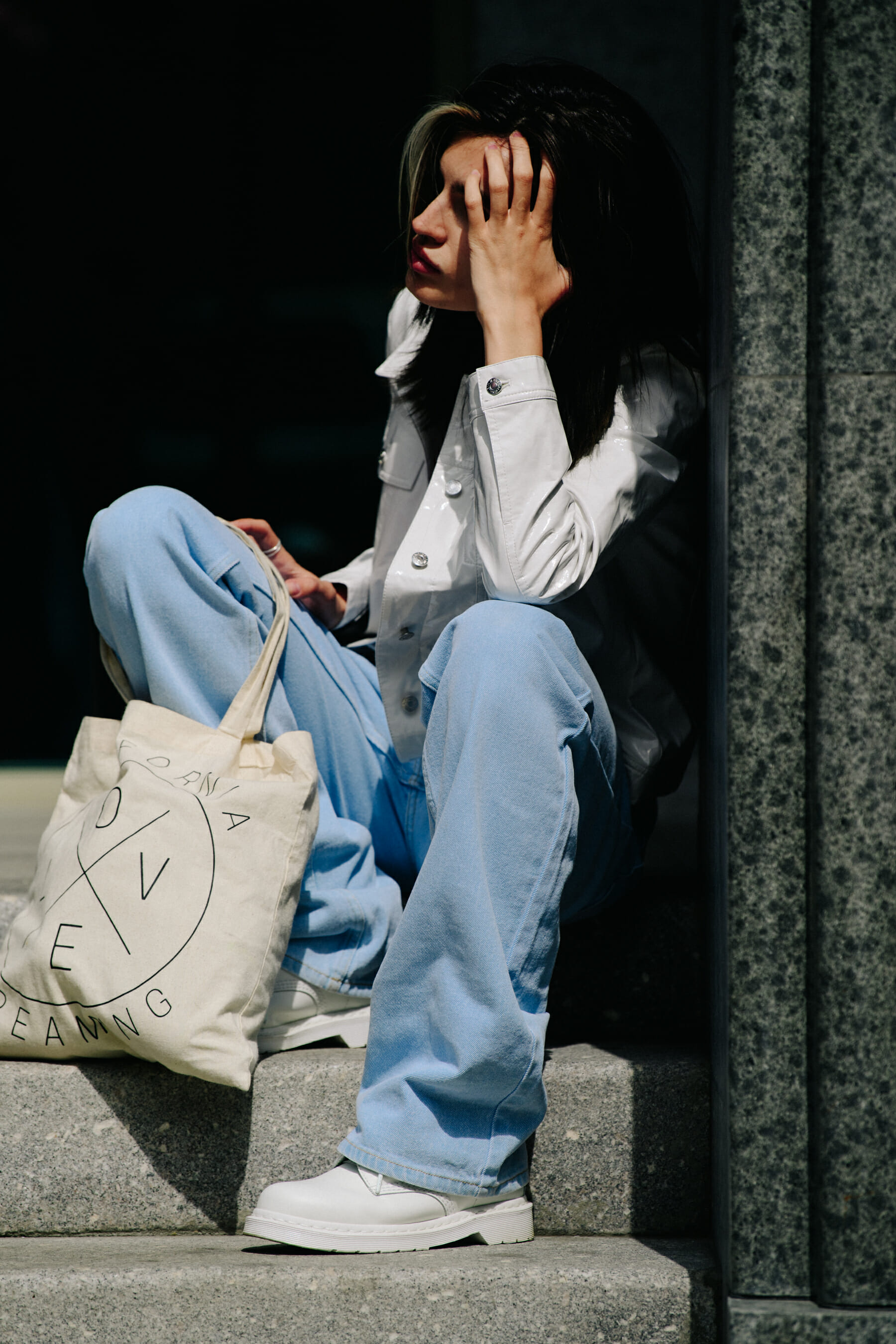 Russian model wearing white denim jacket