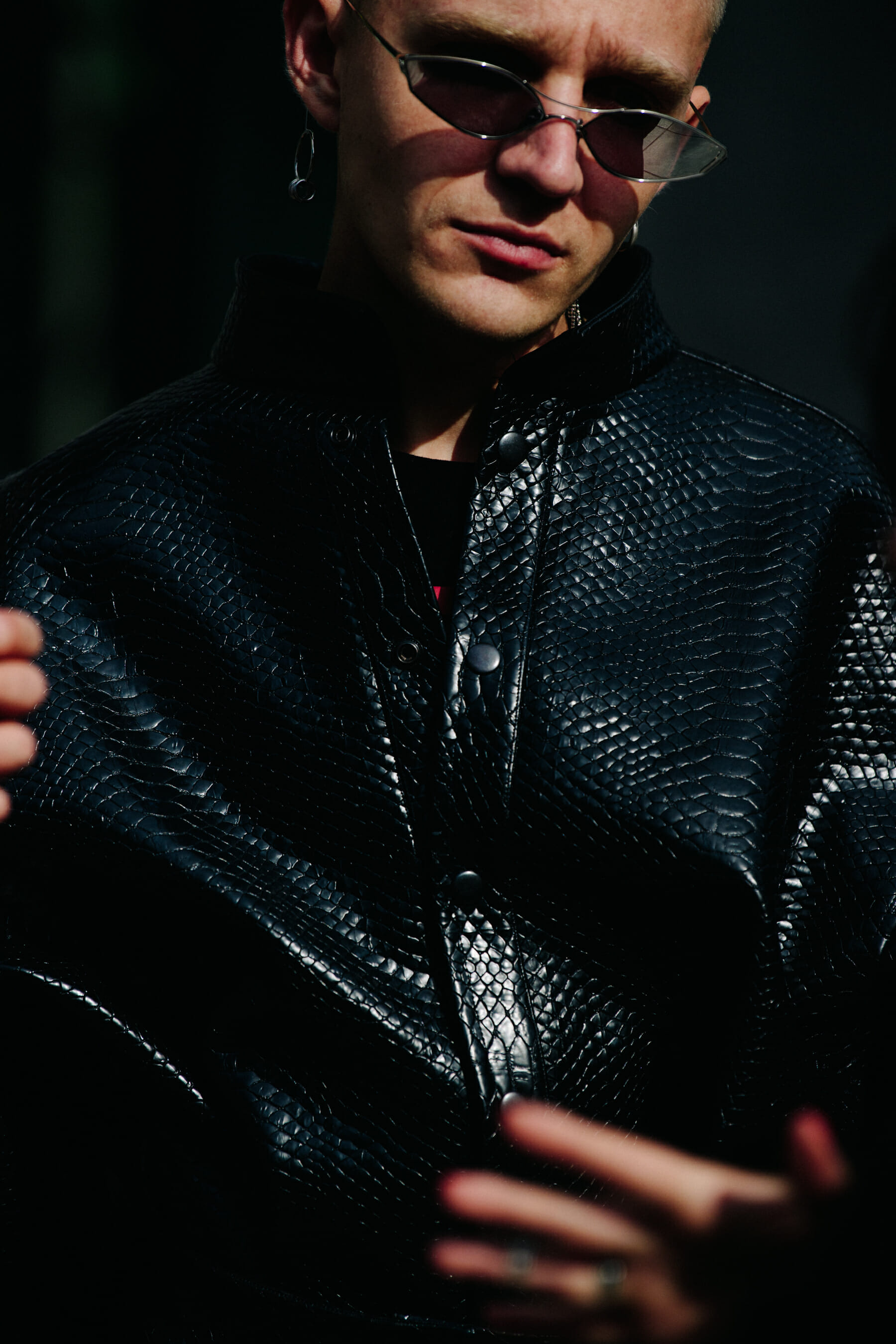 Man wearing black plastic jacket