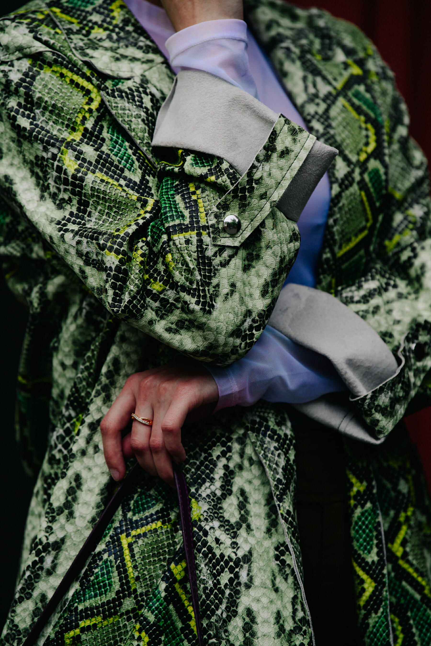 Woman wearing snakeskin jacket