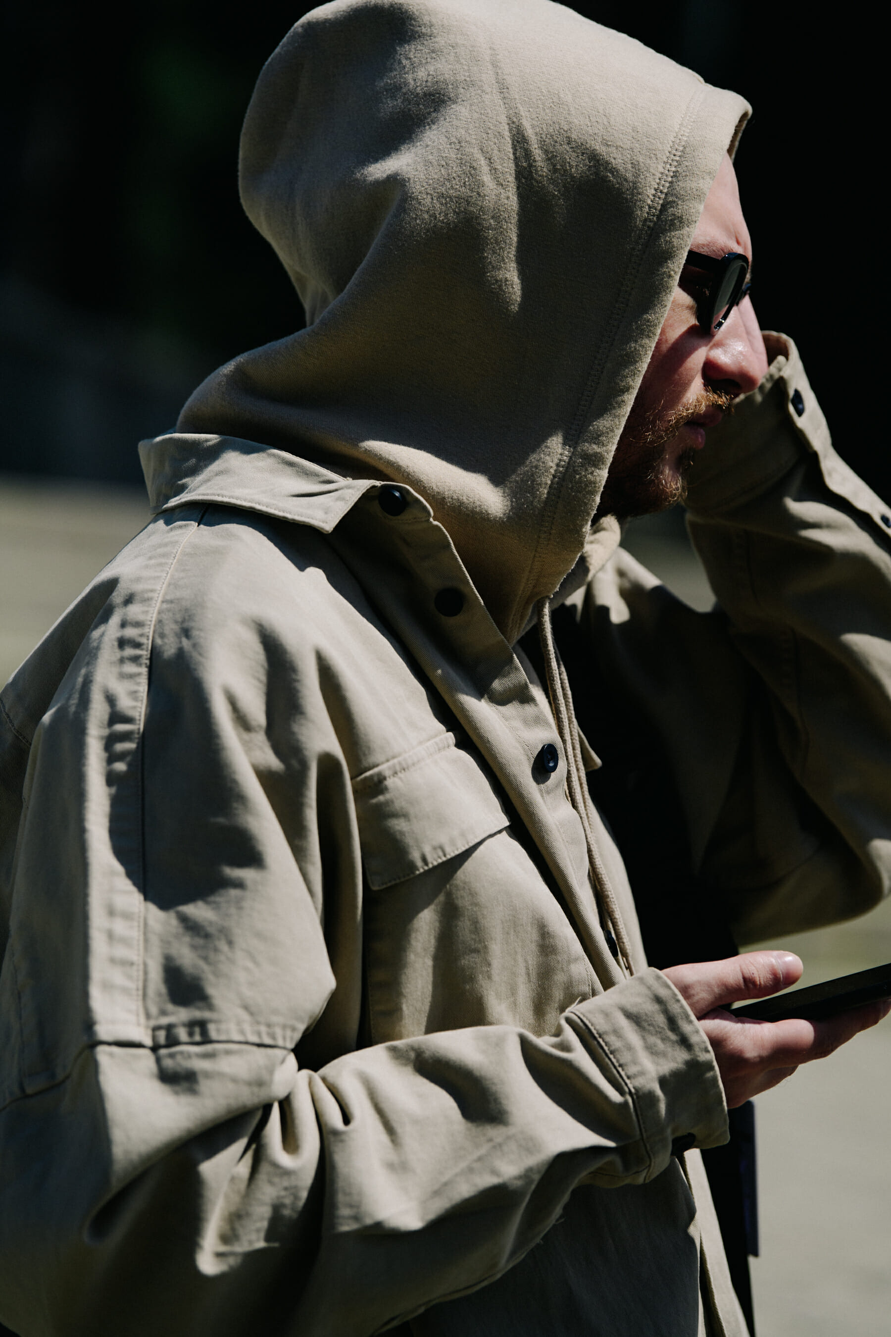 Man wearing beige outfit