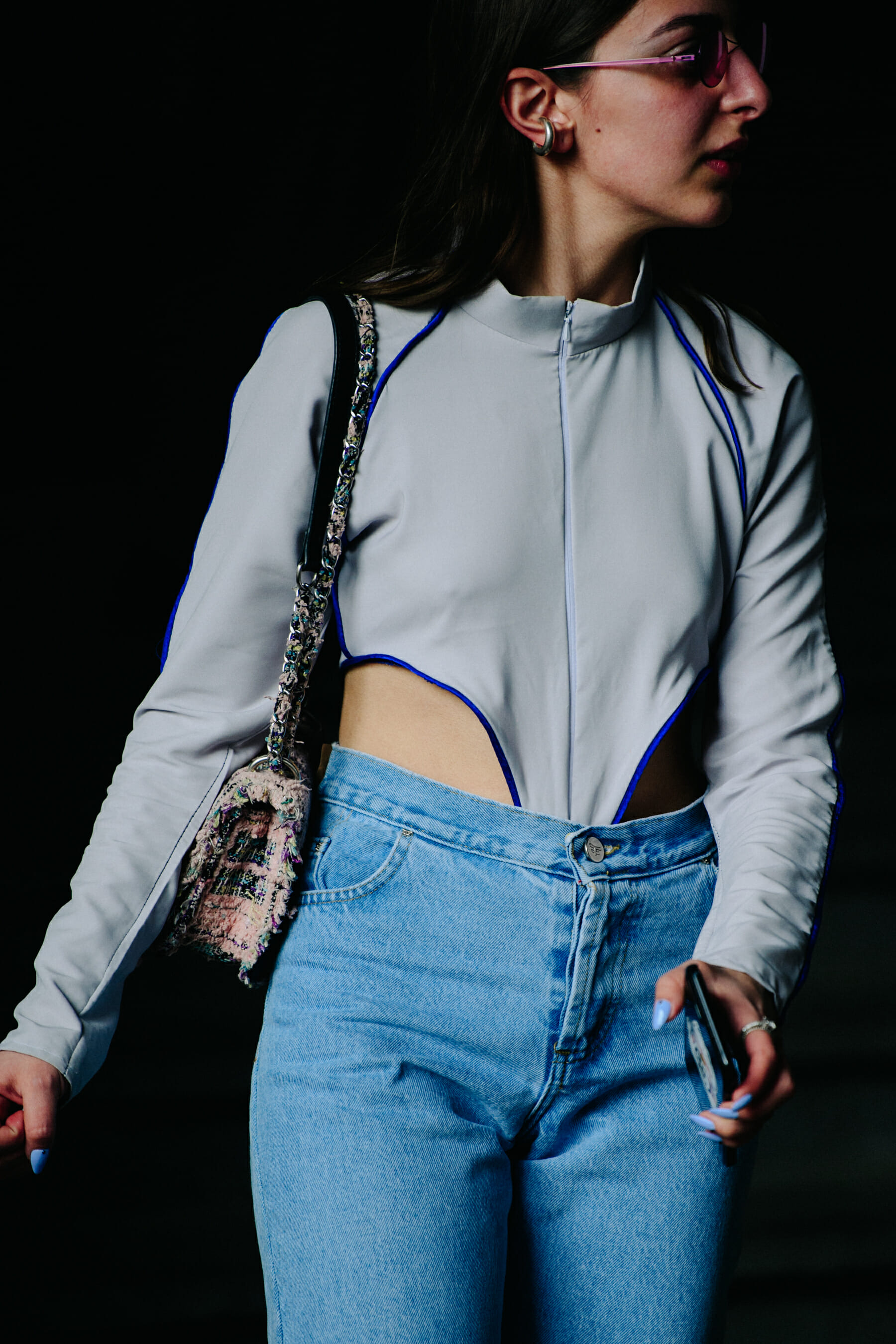 Woman wearing grey track top