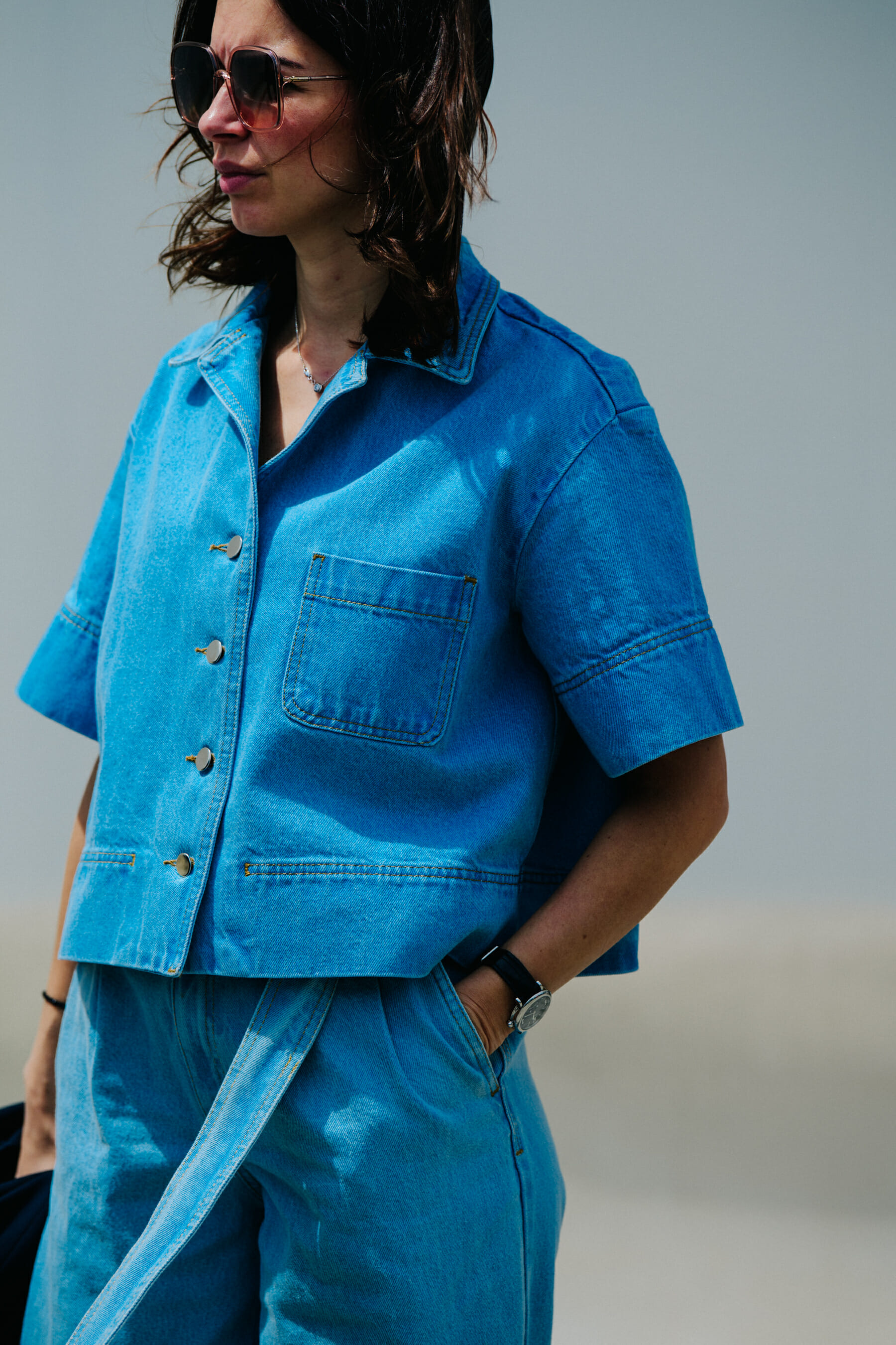 Woman wearing blue denim outfit