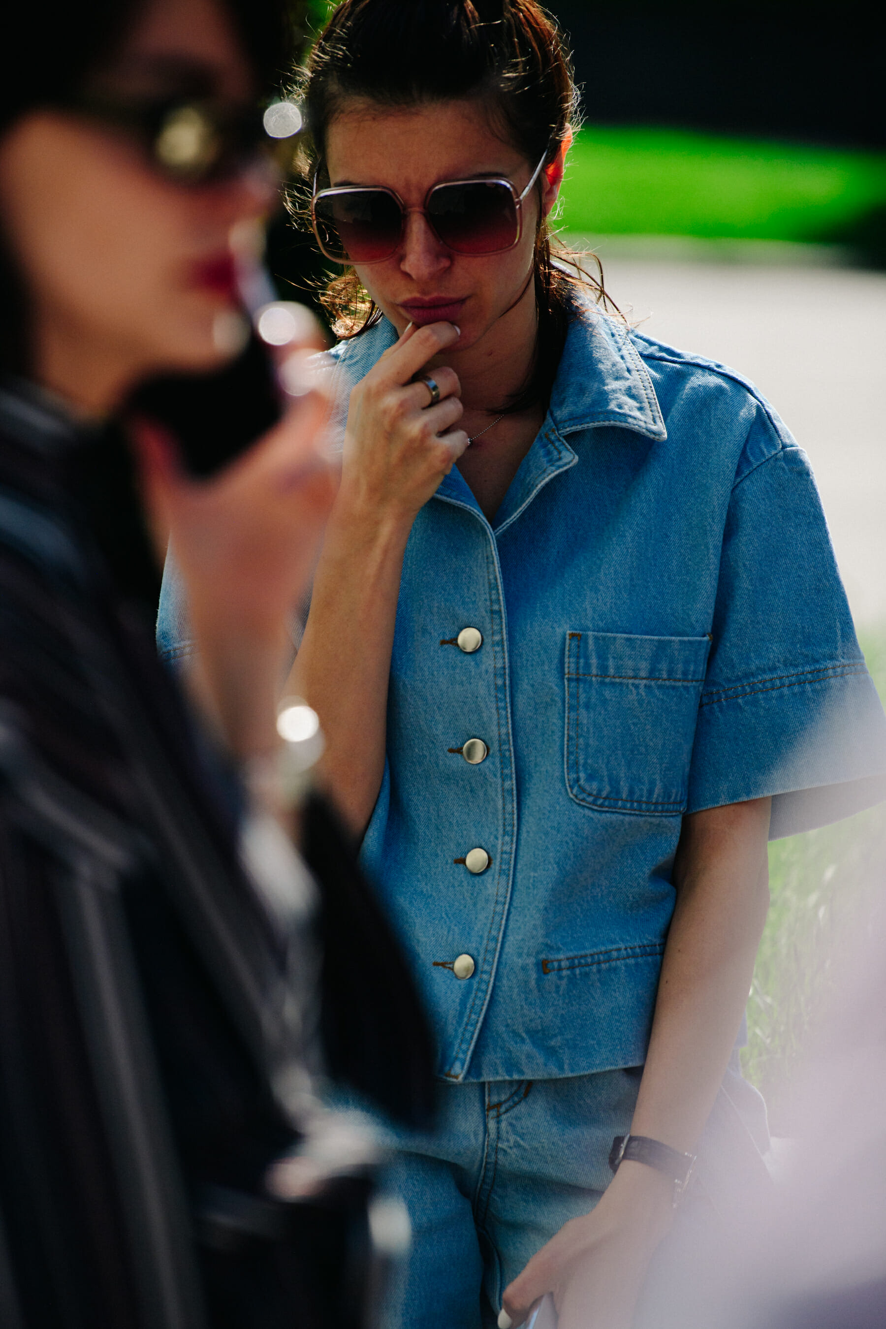 Woman wearing denim jacket