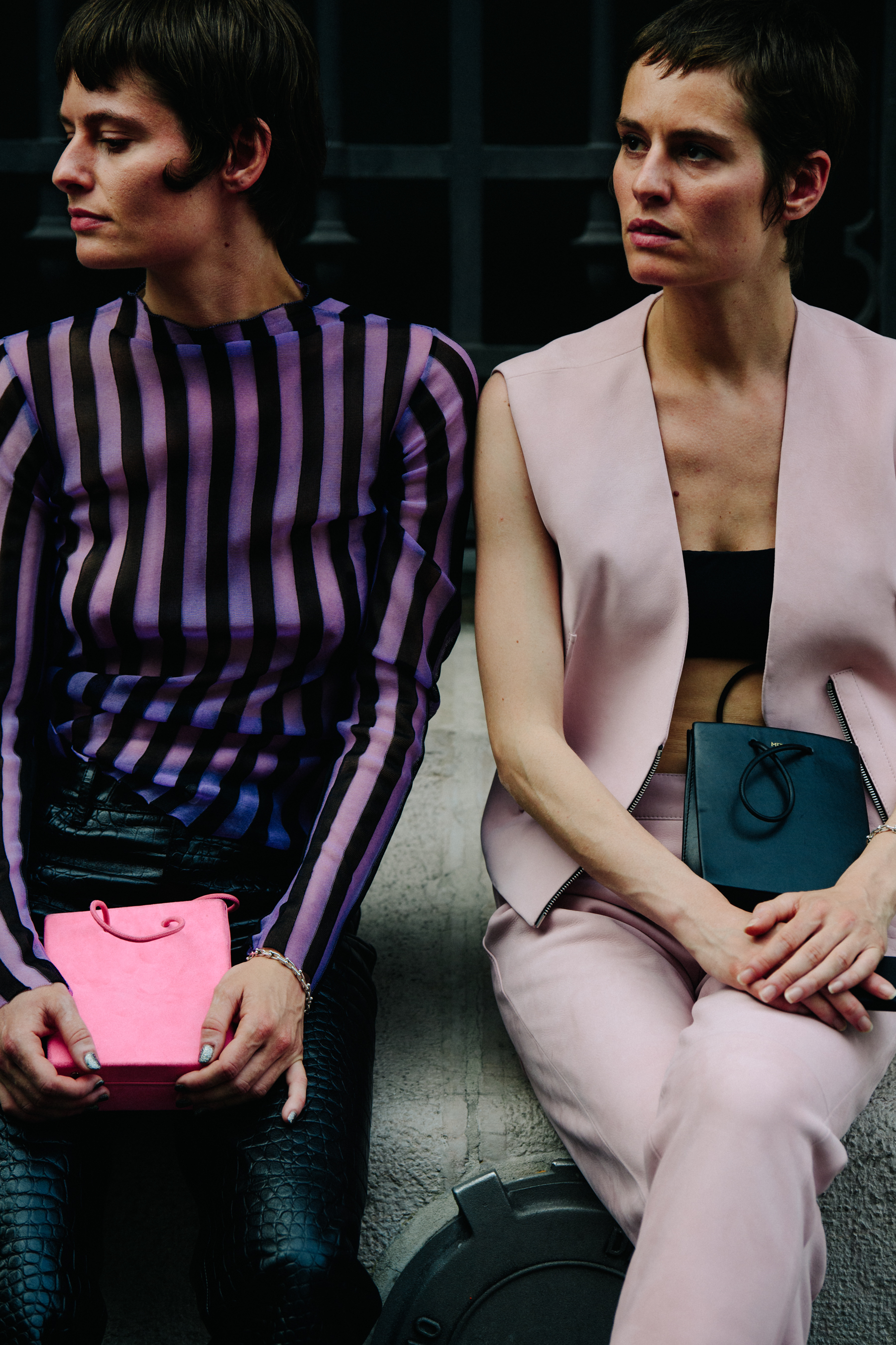 Two women wearing pink