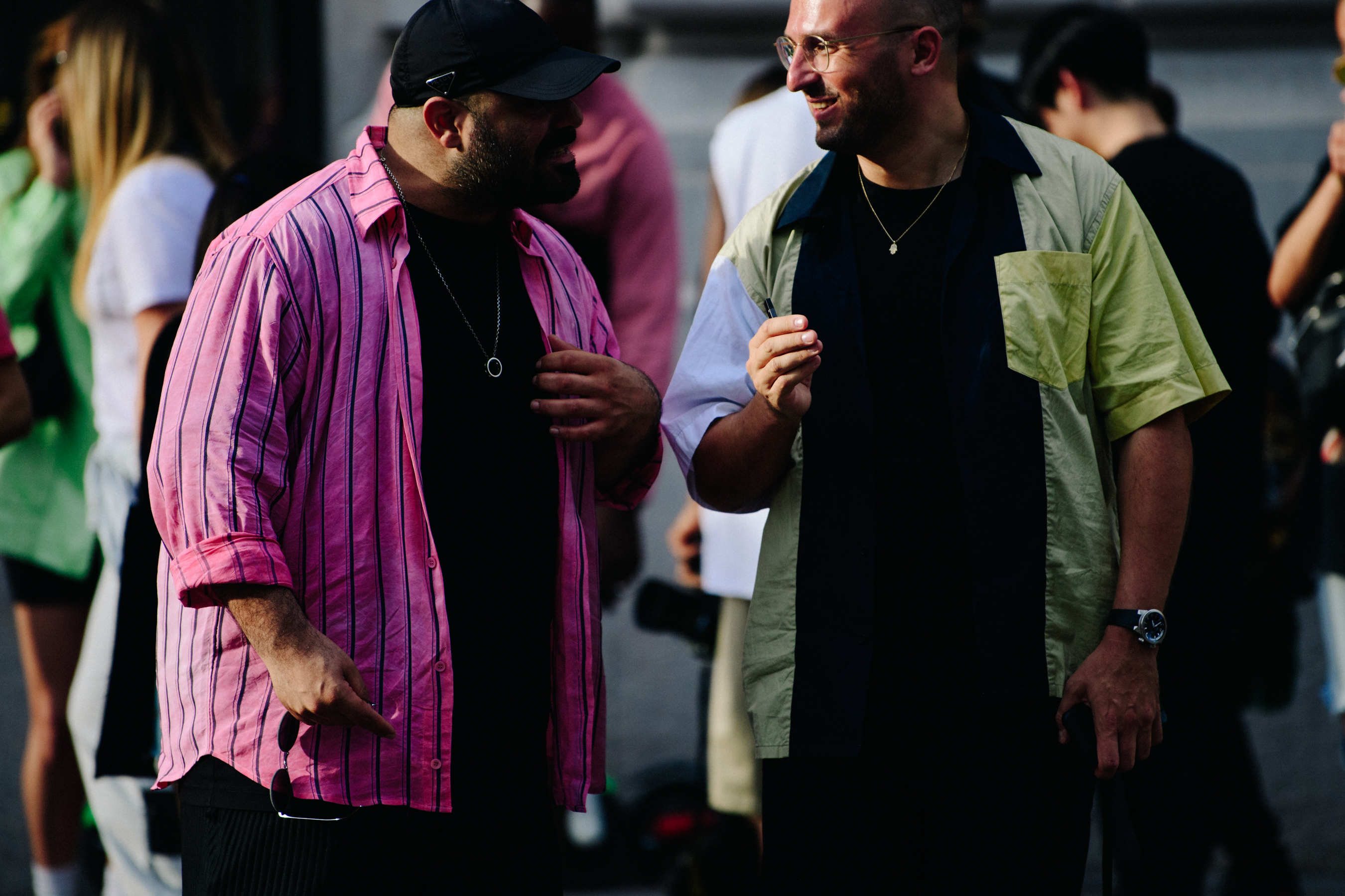 Two men wearing pattern shirts