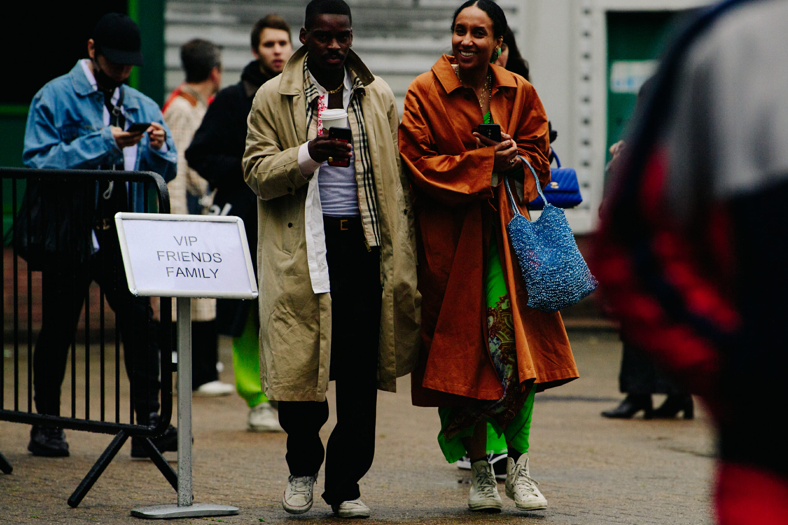 Couple wearing long coats