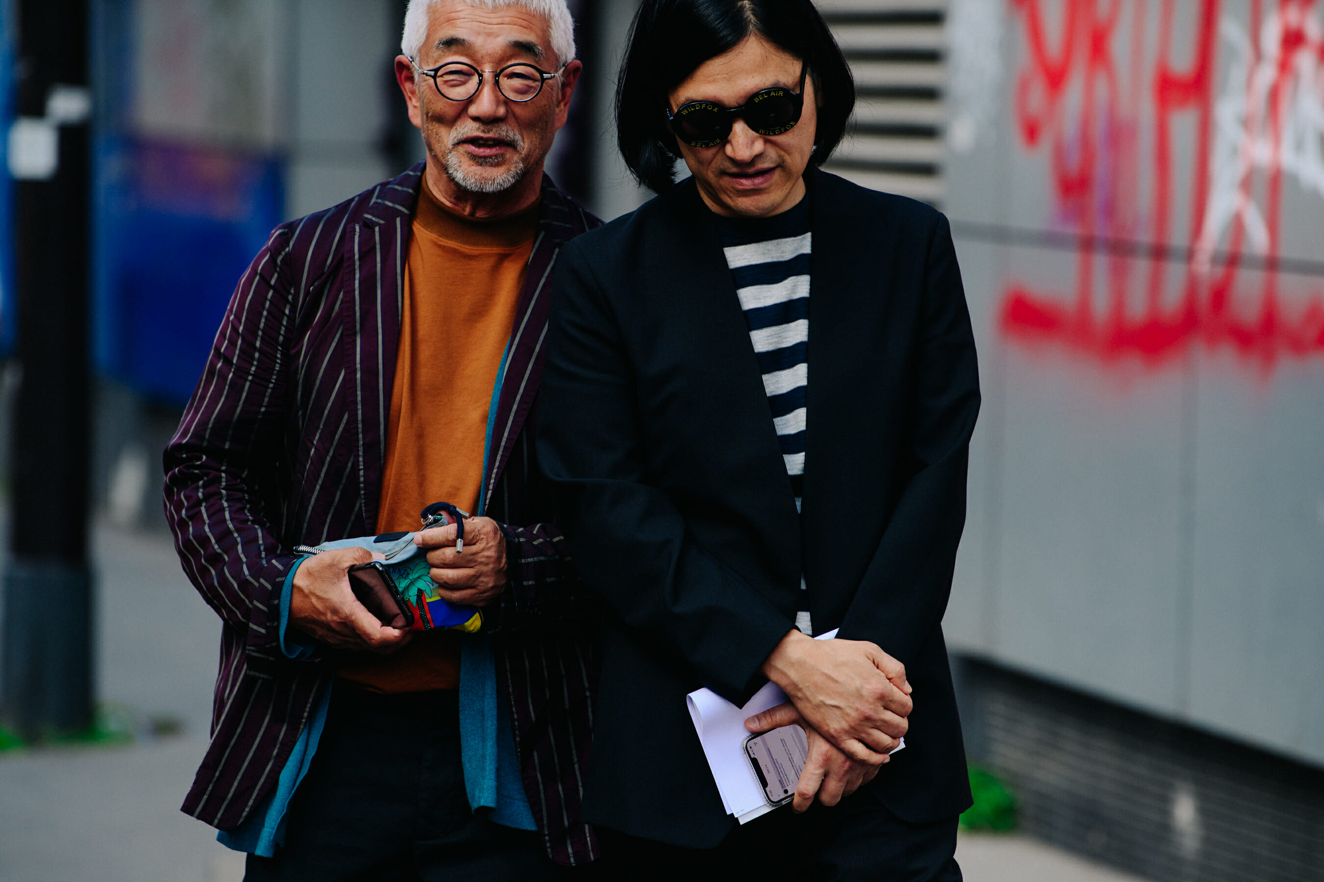 Two men wearing stripes