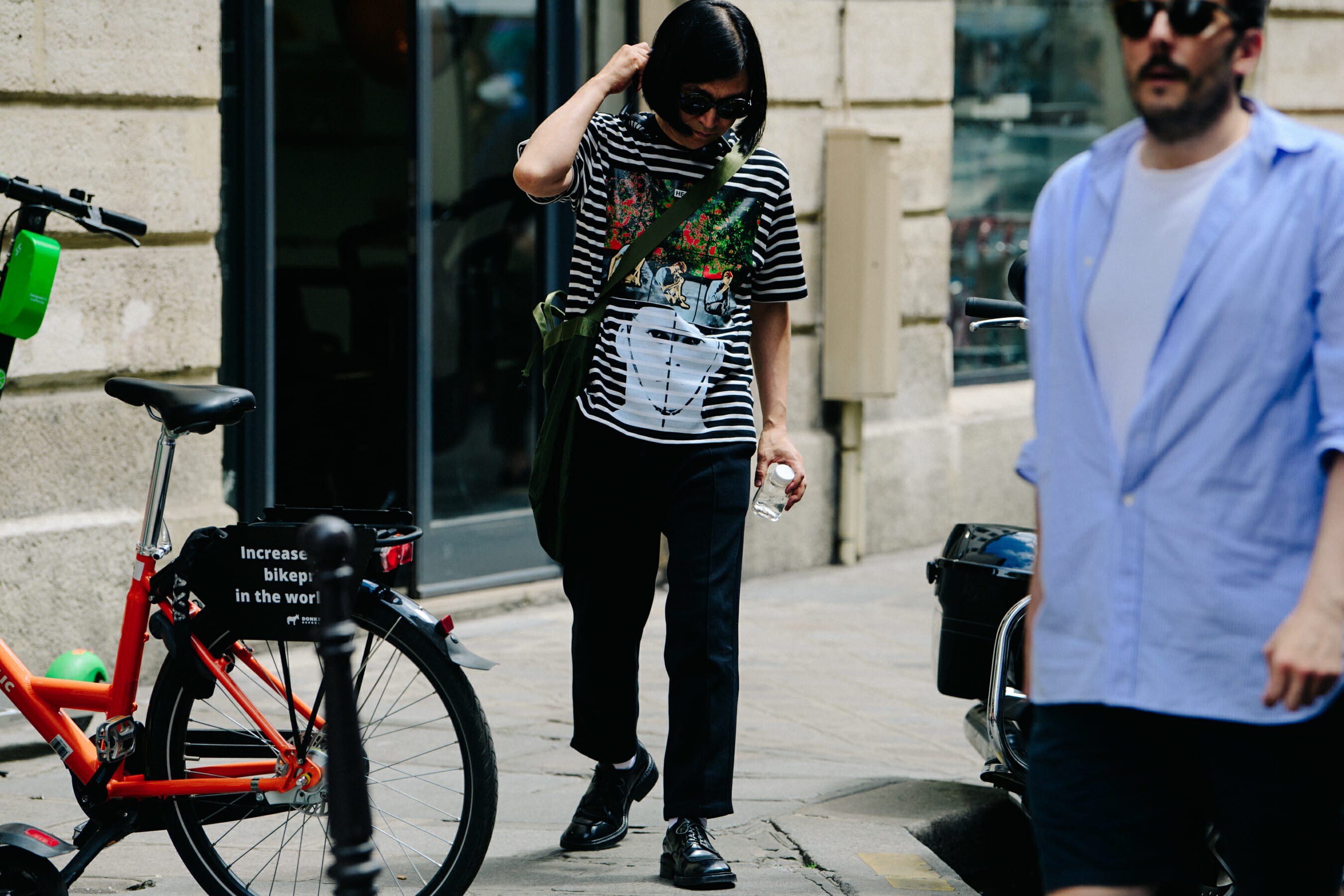 Man wearing striped tee shirt