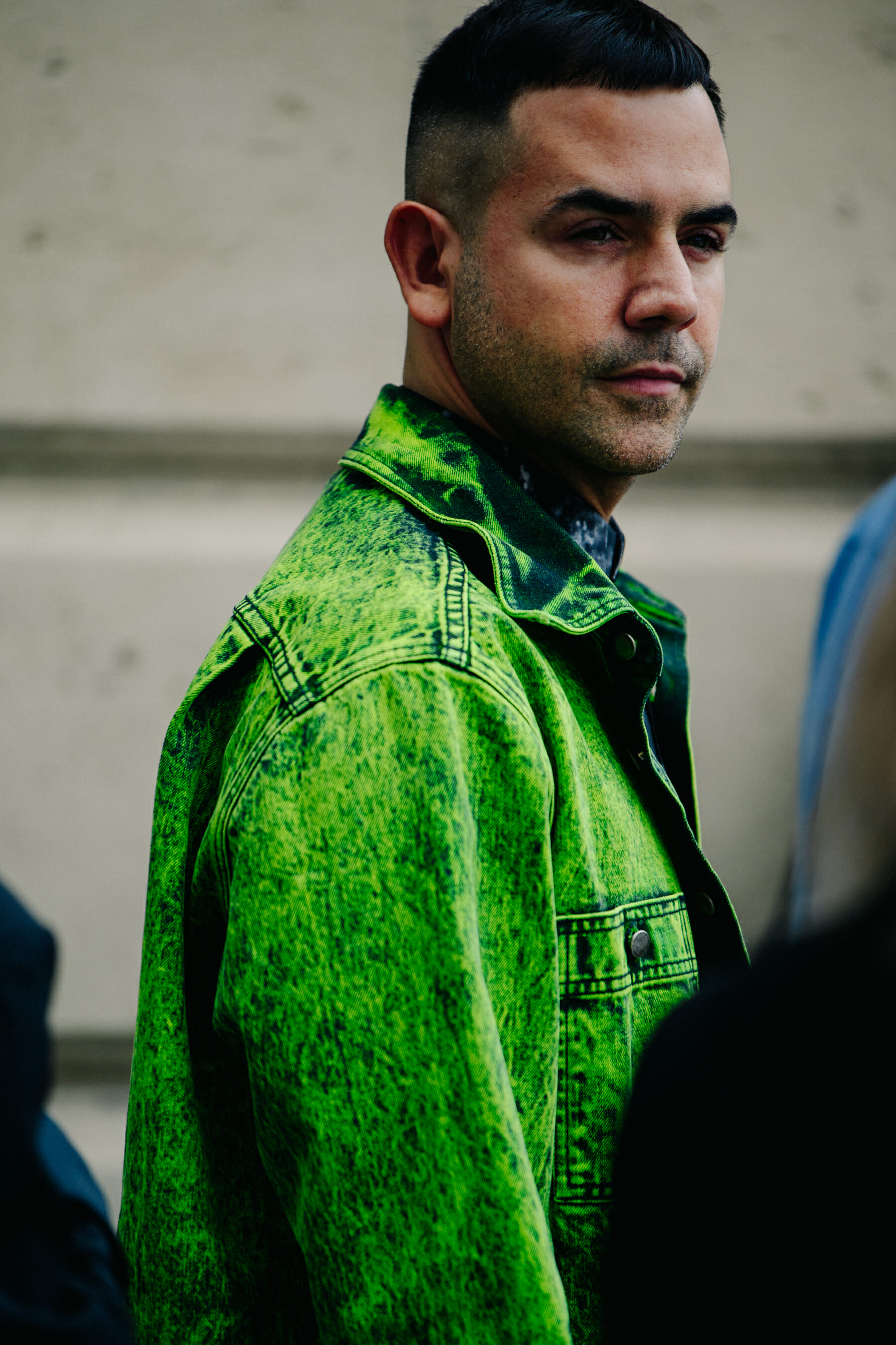 Man wearing green jacket