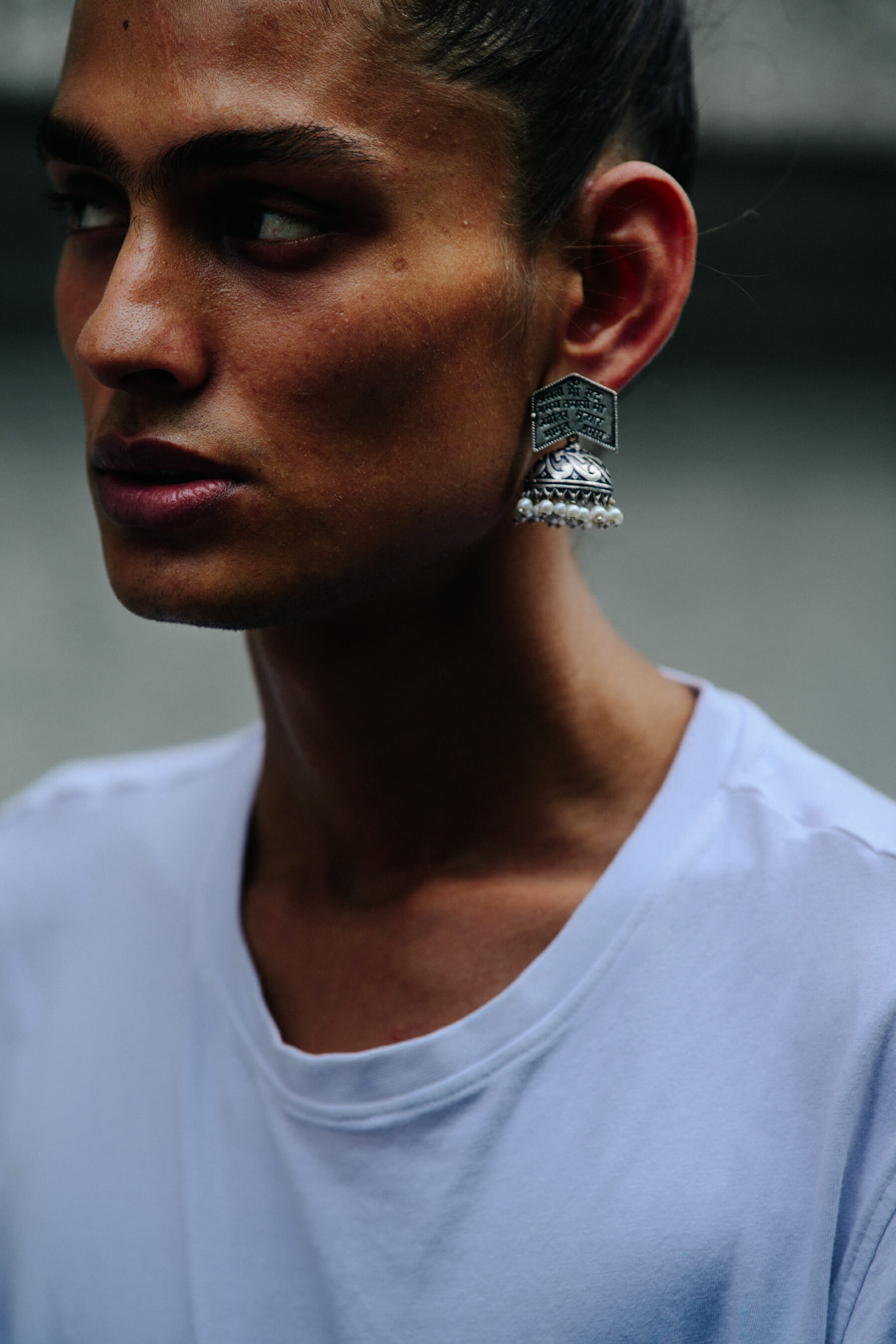 Model wearing white shirt