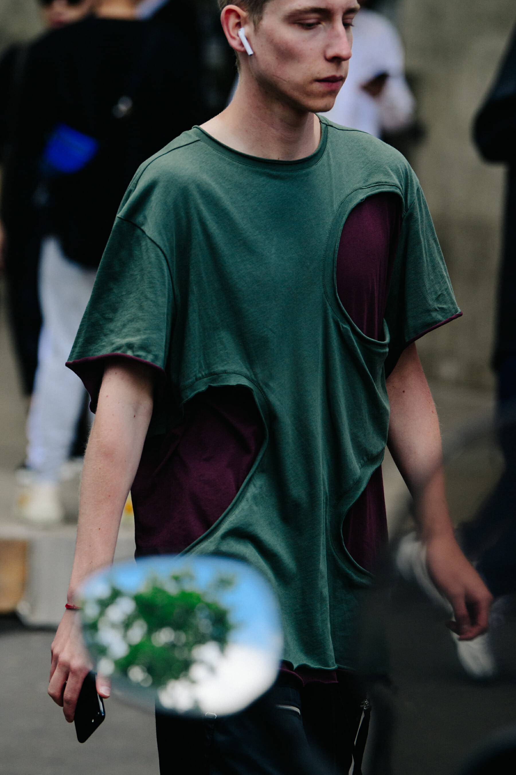 Man wearing green tee shirt