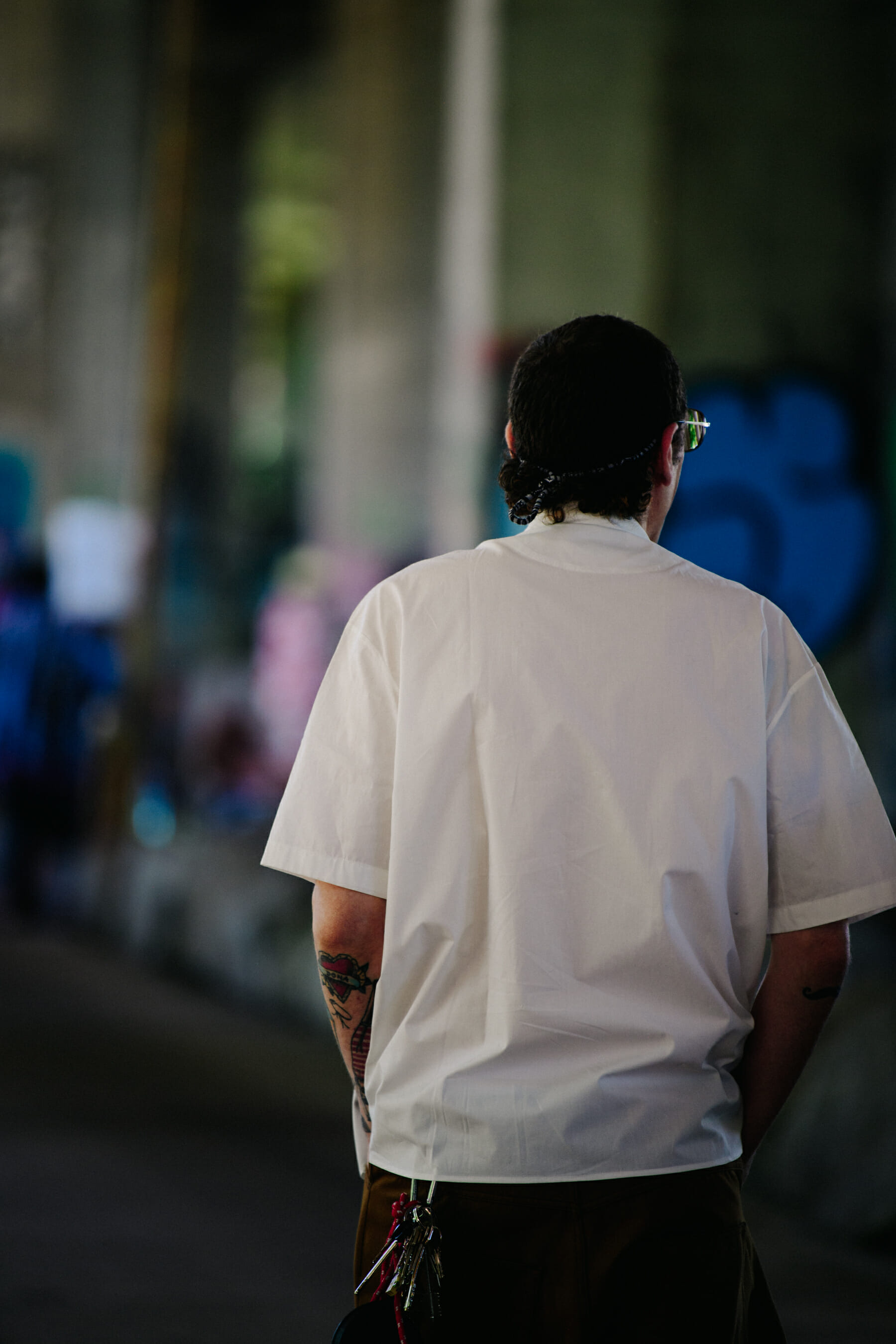 Man wearing white tee shirt