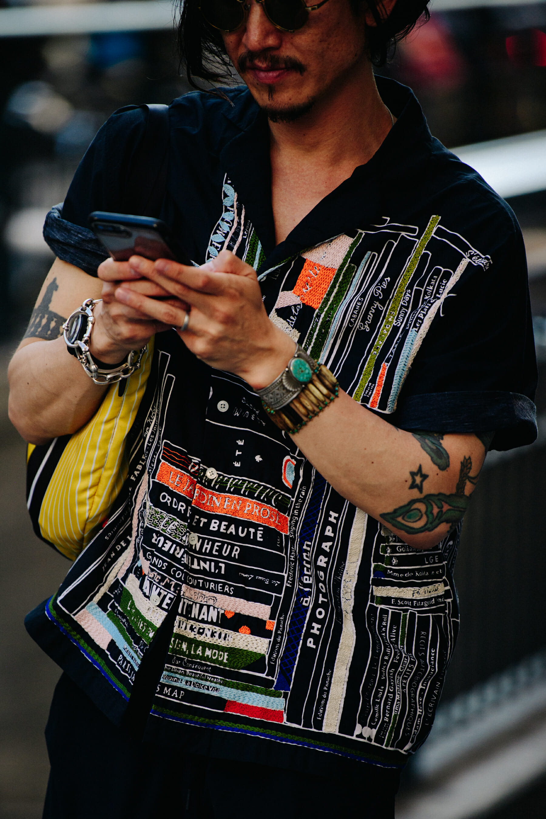 Man wearing black pattern shirt