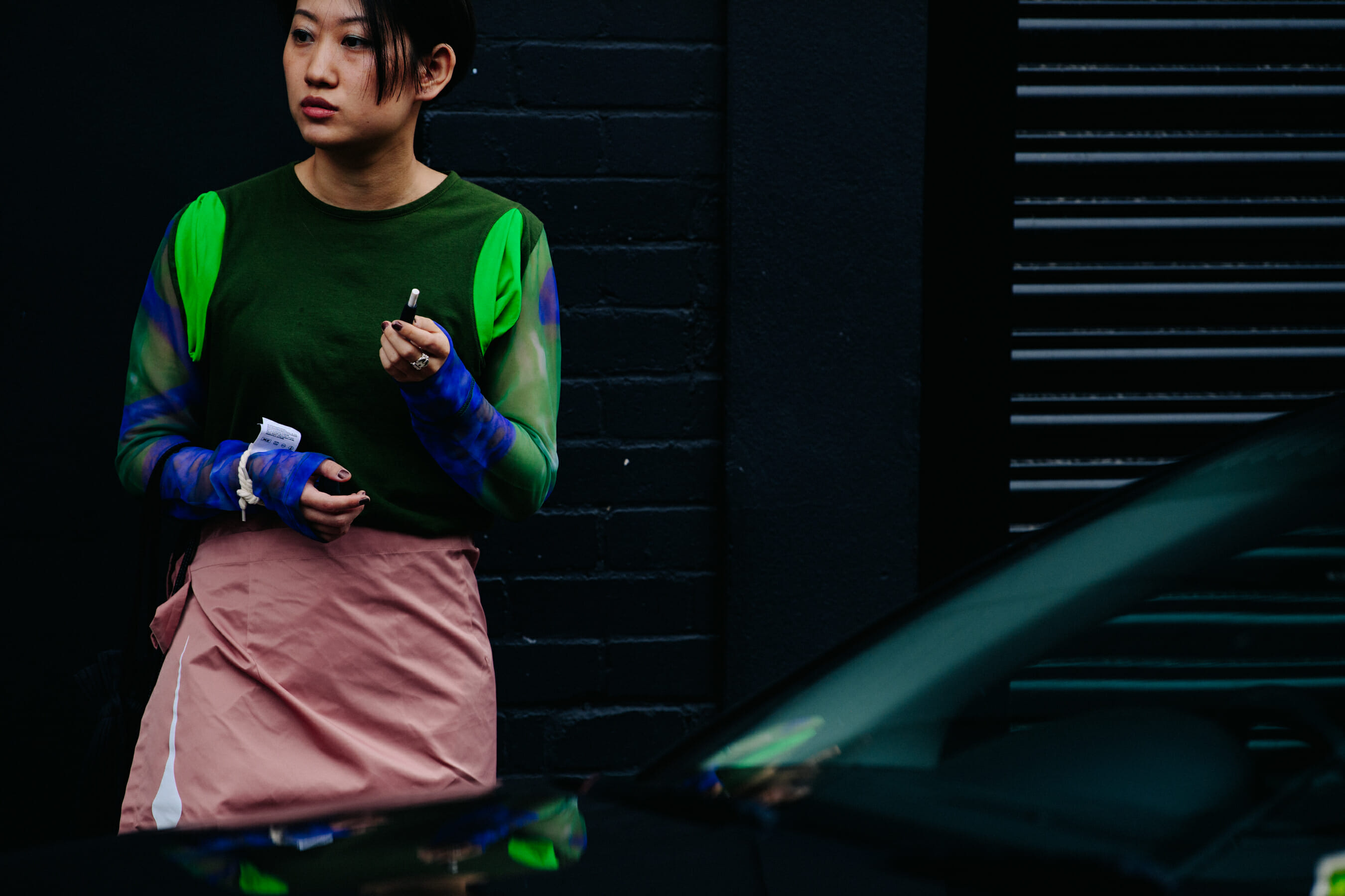 Woman wearing green shirt