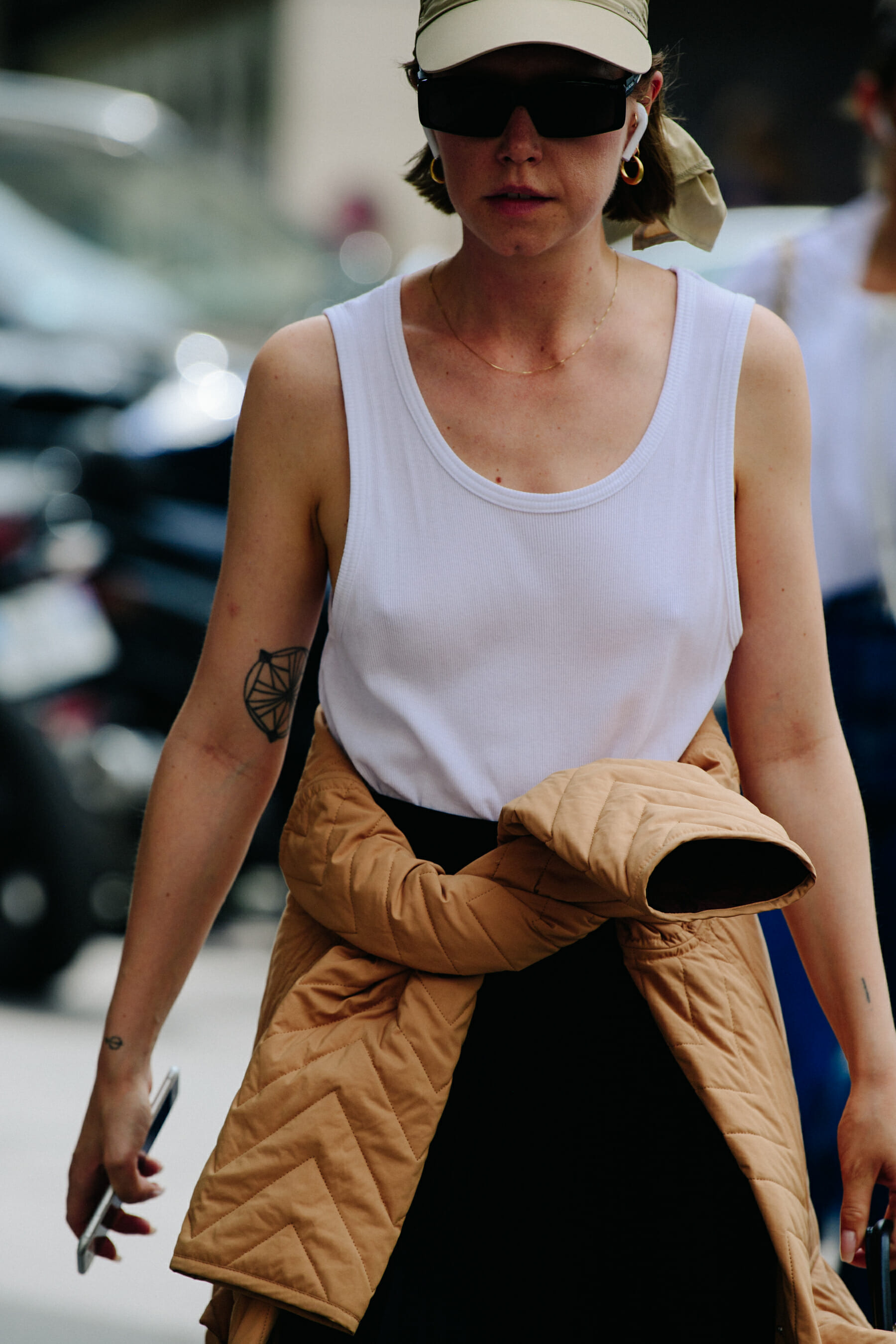 Woman wearing white vest